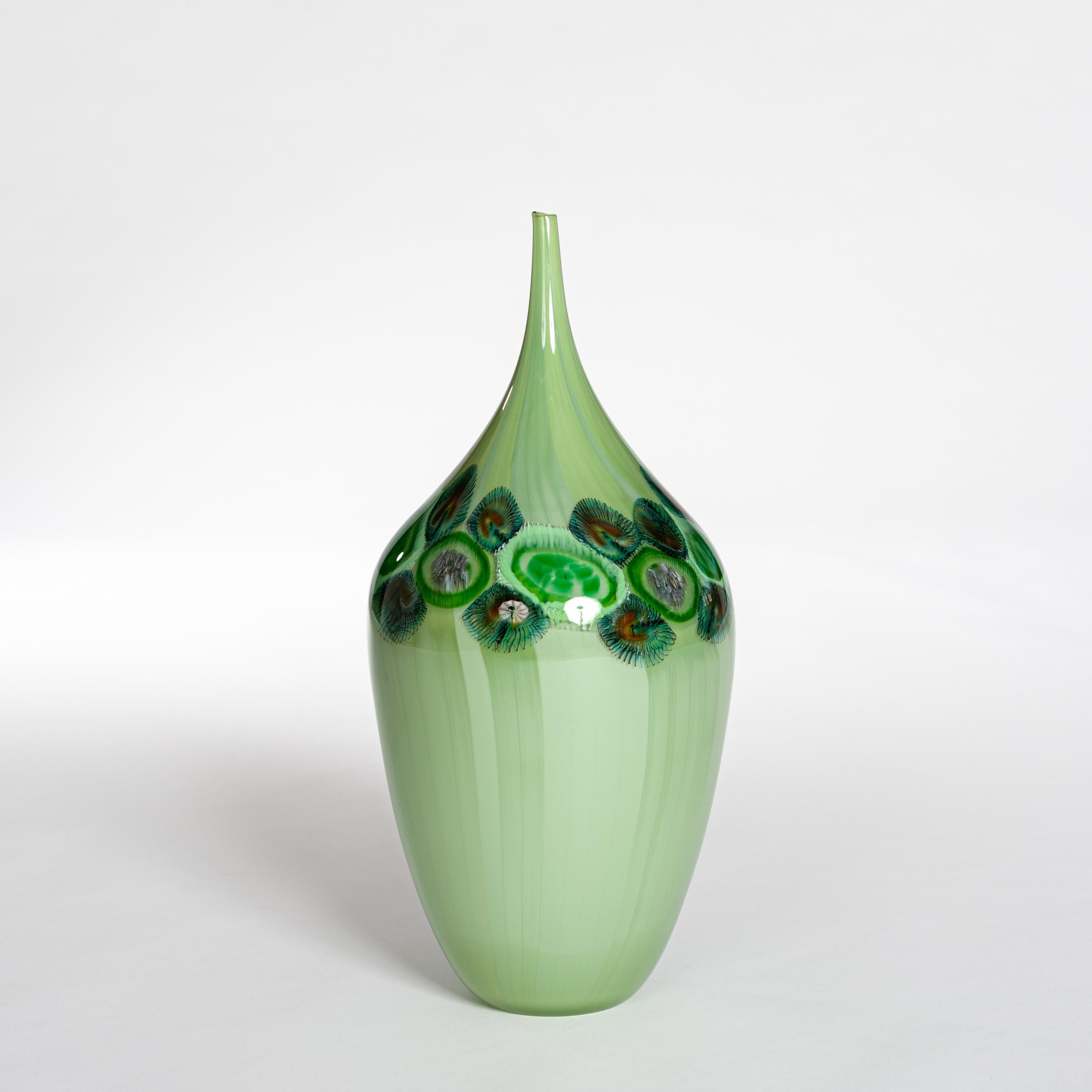 Wonderful lime green Murano glass vase by Afro Celotto. Murrines in emerald green, brown and turquoise.
Very elegant shape, running into a narrow neck.


Afro Celotto was born in Venice, on Burano Island, on August 24, 1963.
Much quieter and