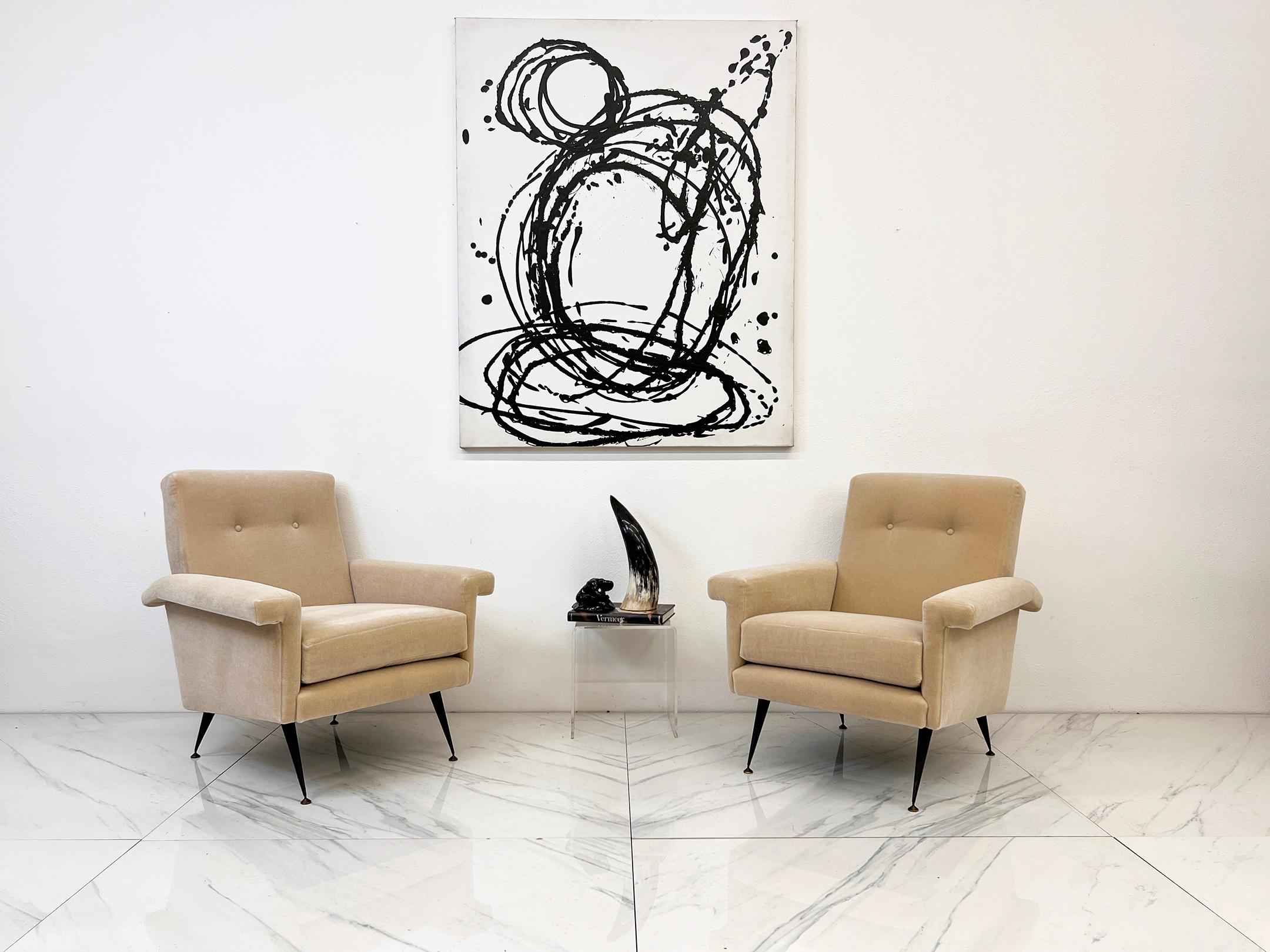 Say ciao to the lounge chairs of your wildest Italian daydreams. This pair of 1960s beauties is basically the Amalfi Coast in chair form—effortlessly chic, impossibly stylish, and screaming La Dolce Vita. Draped in a luxurious buttercream mohair (so
