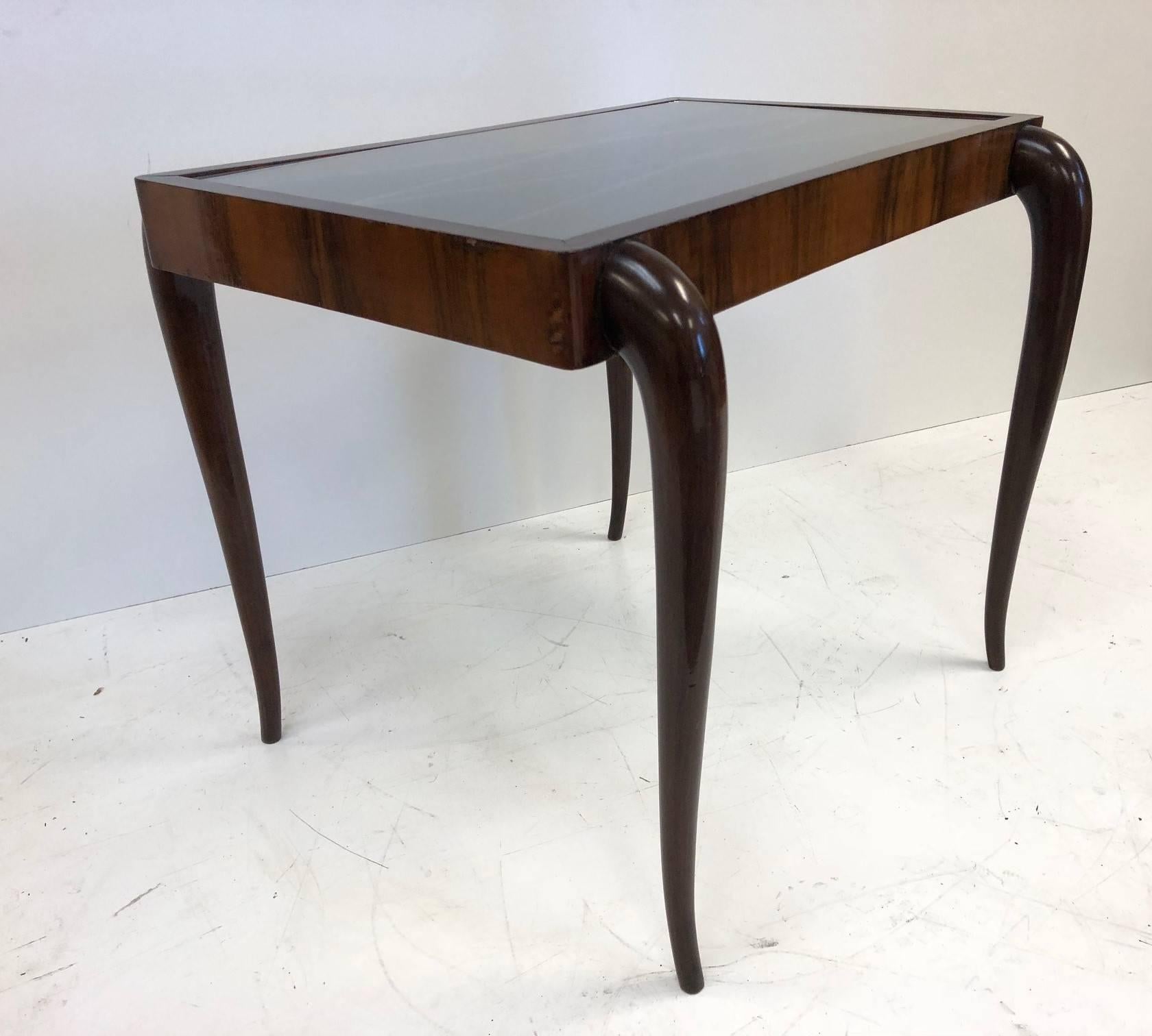 Italian modern mahogany side table in the style of Paolo Buffa. The table is mahogany with a glass and lattice patterned top.