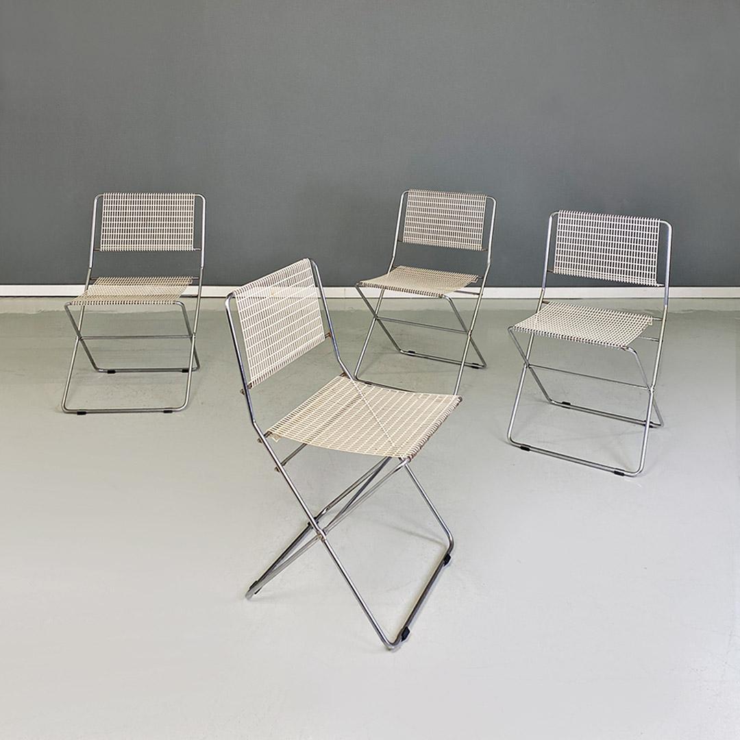 Italian modern set of four chromed metal and metal mesh adjustable chairs by Guido De Marco and Roberto Rebolini for Robots, 1970s
Adjustable metal chairs with chromed metal rod structure with seat and back in white metal mesh, with oxidations and
