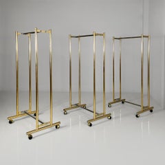 Italian modern metal coat racks gold and silver finish with casters, 1980s