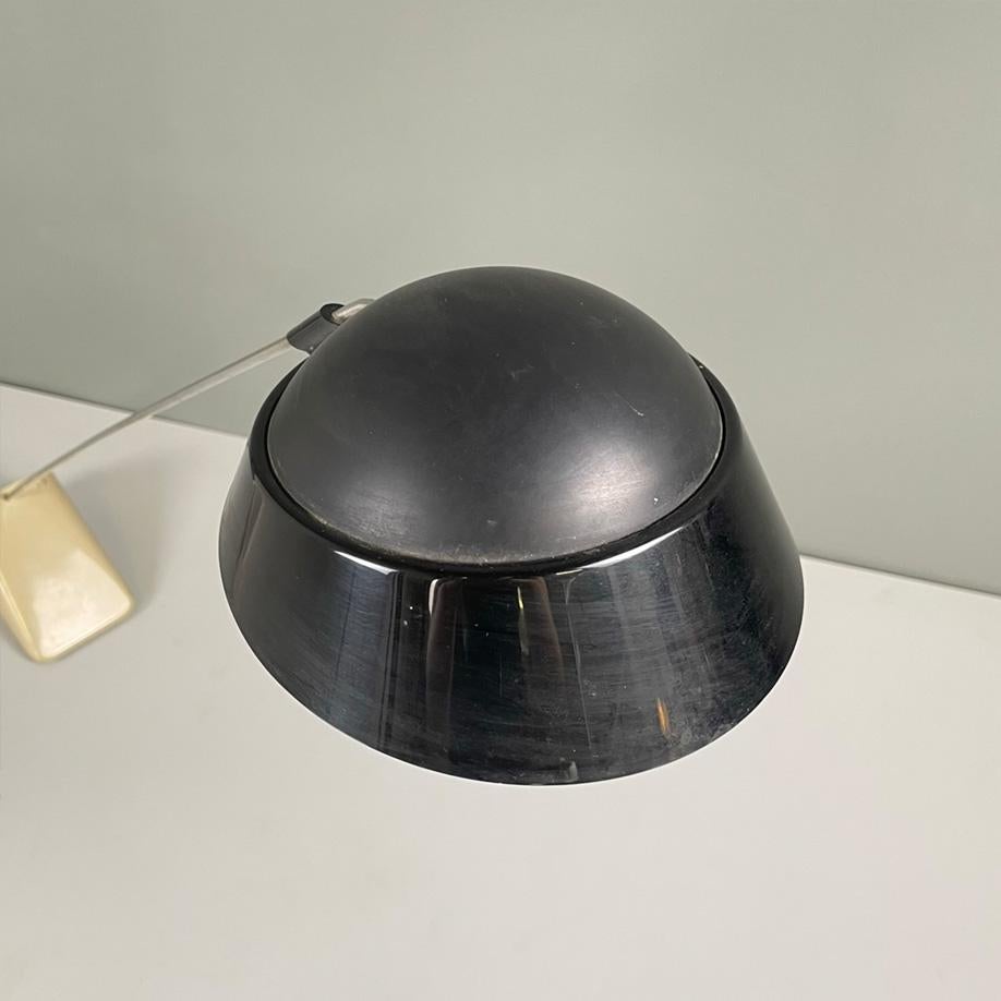 Late 20th Century Italian modern metal rod black diffuser and beige plastic base table lamp, 1980s For Sale