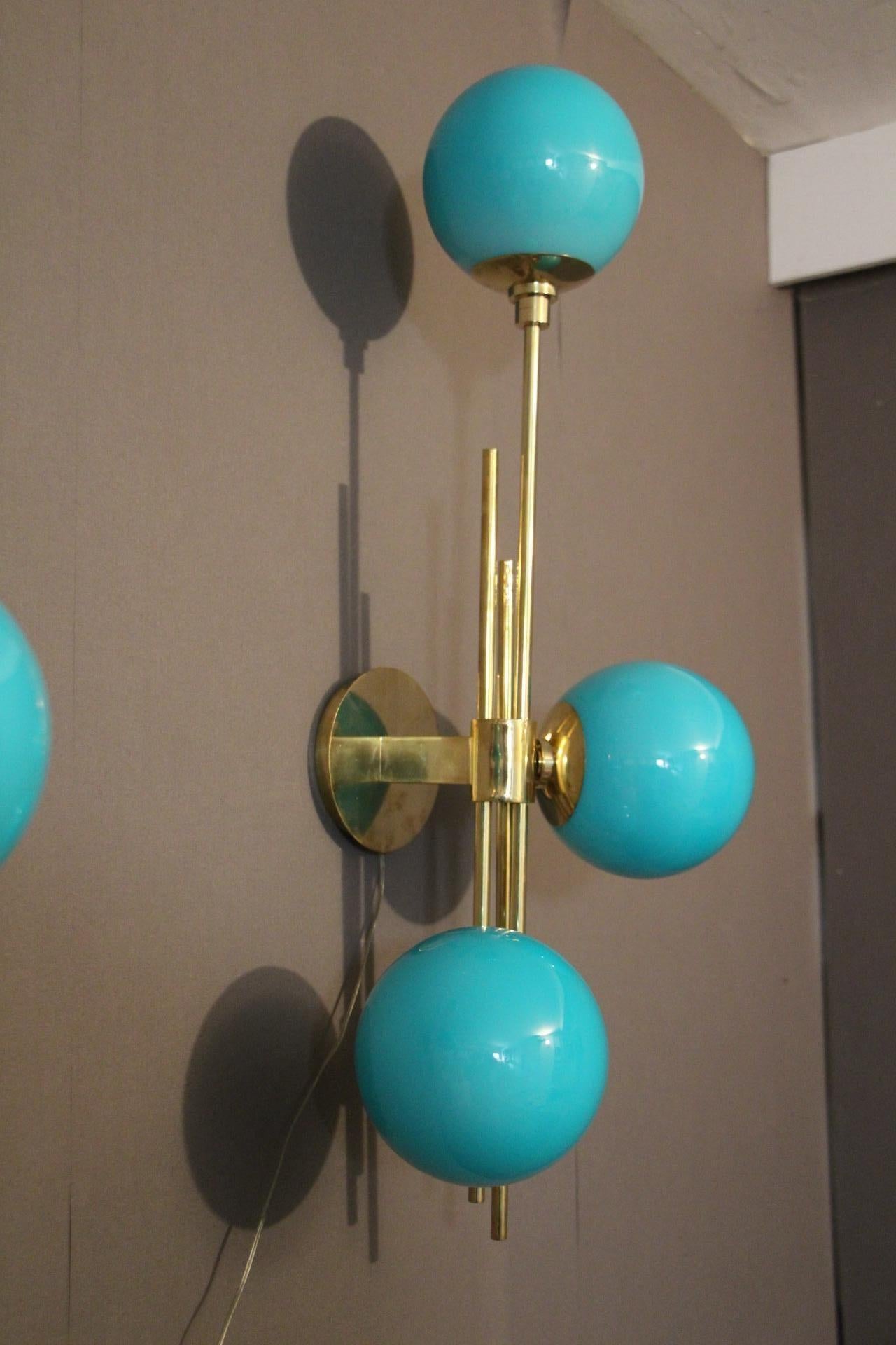 These sconces are very elegant with their brass frame and Tiffany blue Murano glass dome. They have got very unusual geometrical proportions and are very elegant.
Takes E14 bulbs. Wired for U.S.
Each sconce weight's is 4 kg.