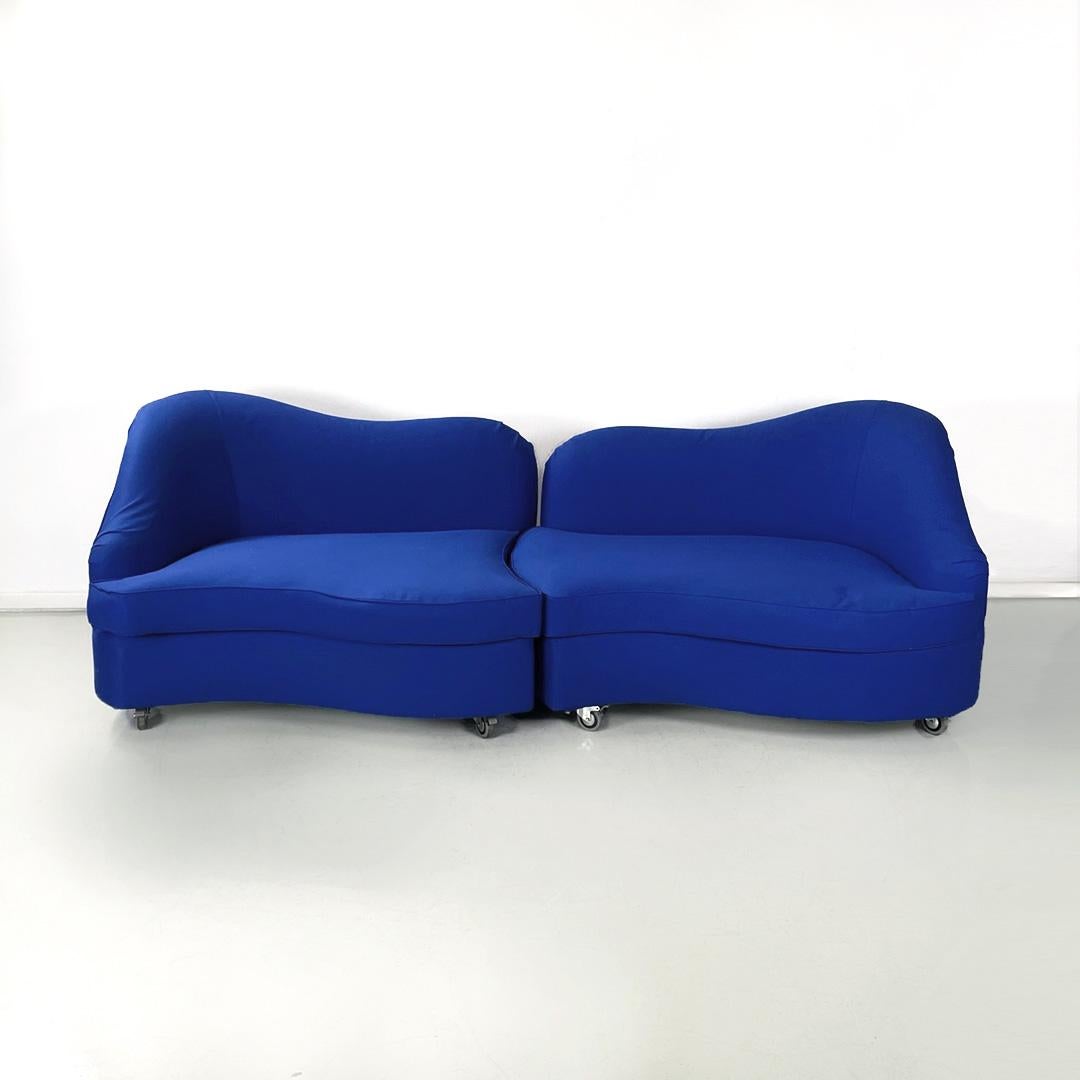 Italian modern modular sofa in electric blue fabric by Maison Gilardino, 1990s
Modular rounded sofa, fully padded and upholstered in electric blue fabric. The upper part of the backrest is curved, as is the seat. The two modules approach following a