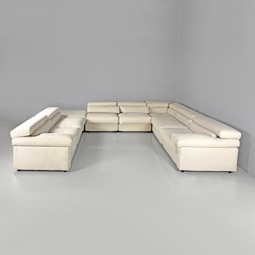 Italian modern modular white sofa Erasmo by Afra and Tobia Scarpa for B&B, 1970s
Modular sofa mod. Erasmo covered in white fabric tending to beige. The sofa is composed of eight modules, two of which with armrests, four simple ones, a corner one and