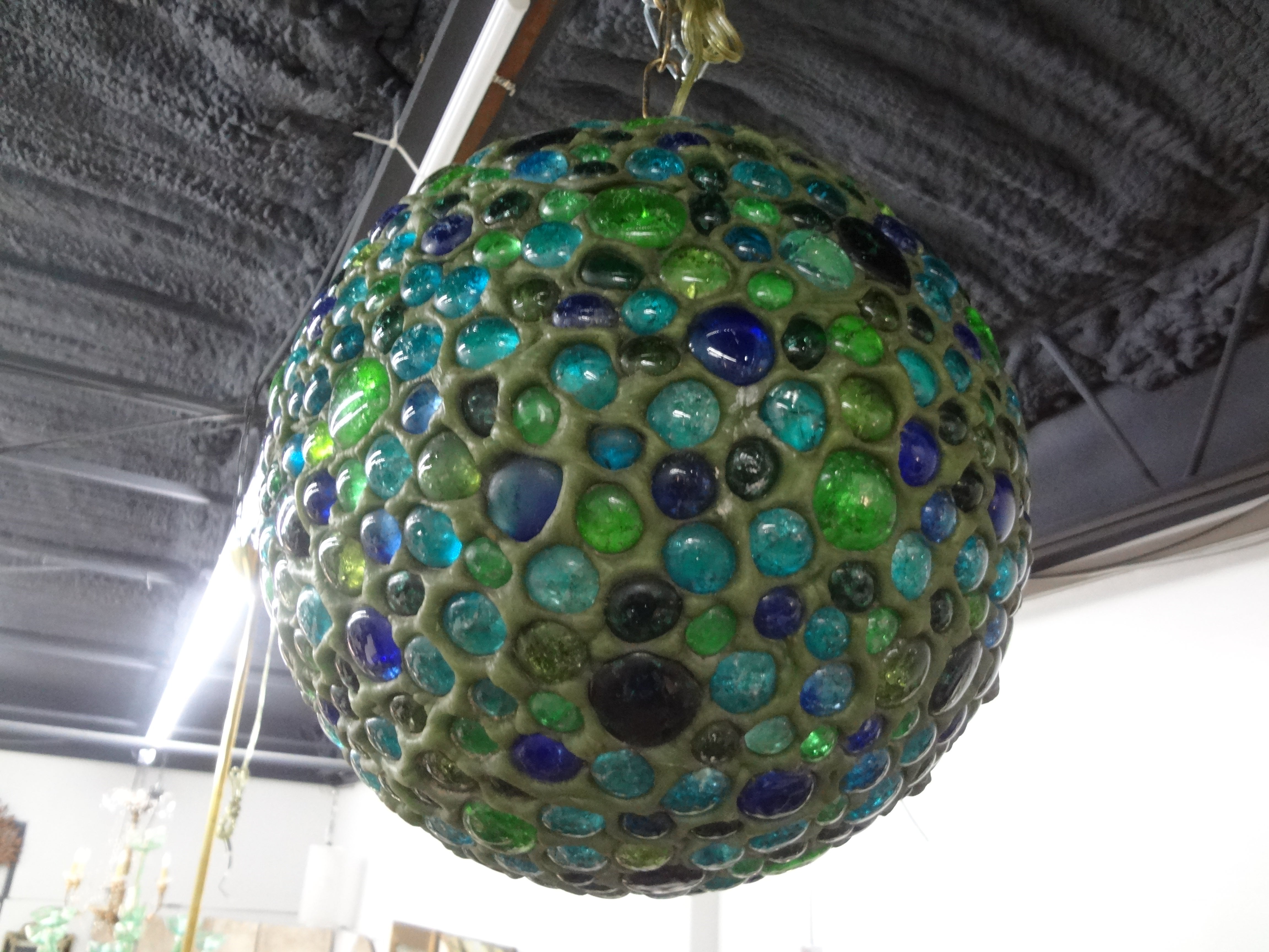 Italian Modern Multicolored Glass Lantern. Stunning Italian multicolored glass sphere lantern of green, blue and turquoise applied glass. Newly wired for the U.S. market with a new single Edison socket. Dimensions given are for the globe only and 