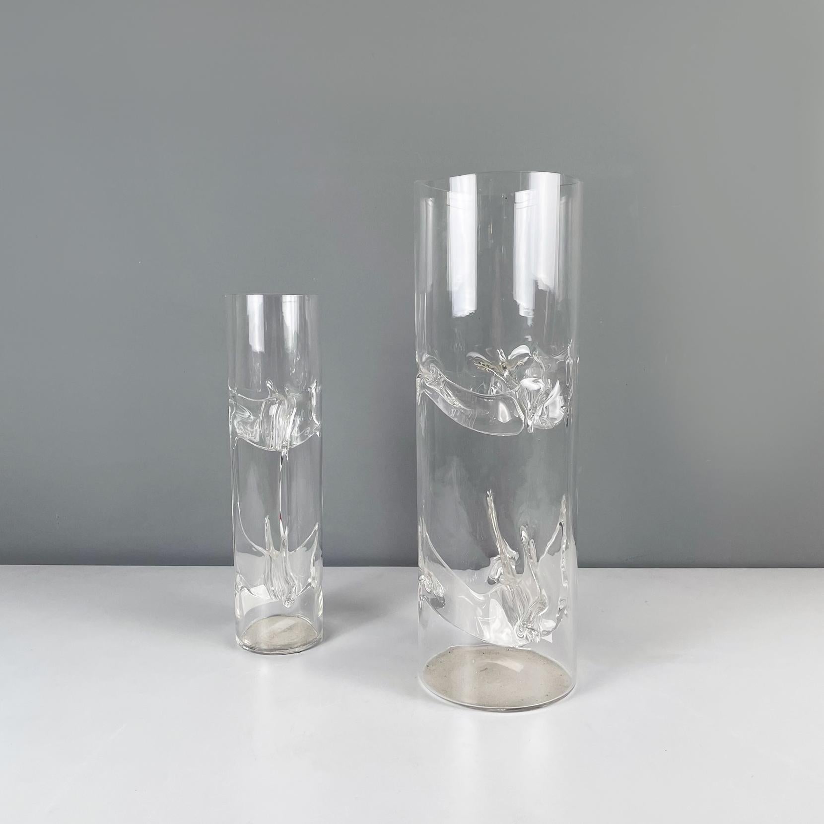 Italian modern Murano crystal Vases Membrana by Toni Zuccheri for VeArt, 1970s
Pair of particular and fantastic vases mod. Membrana of different sizes in transparent Murano crystal. Inside the cylindrical structure there are a series of crystal