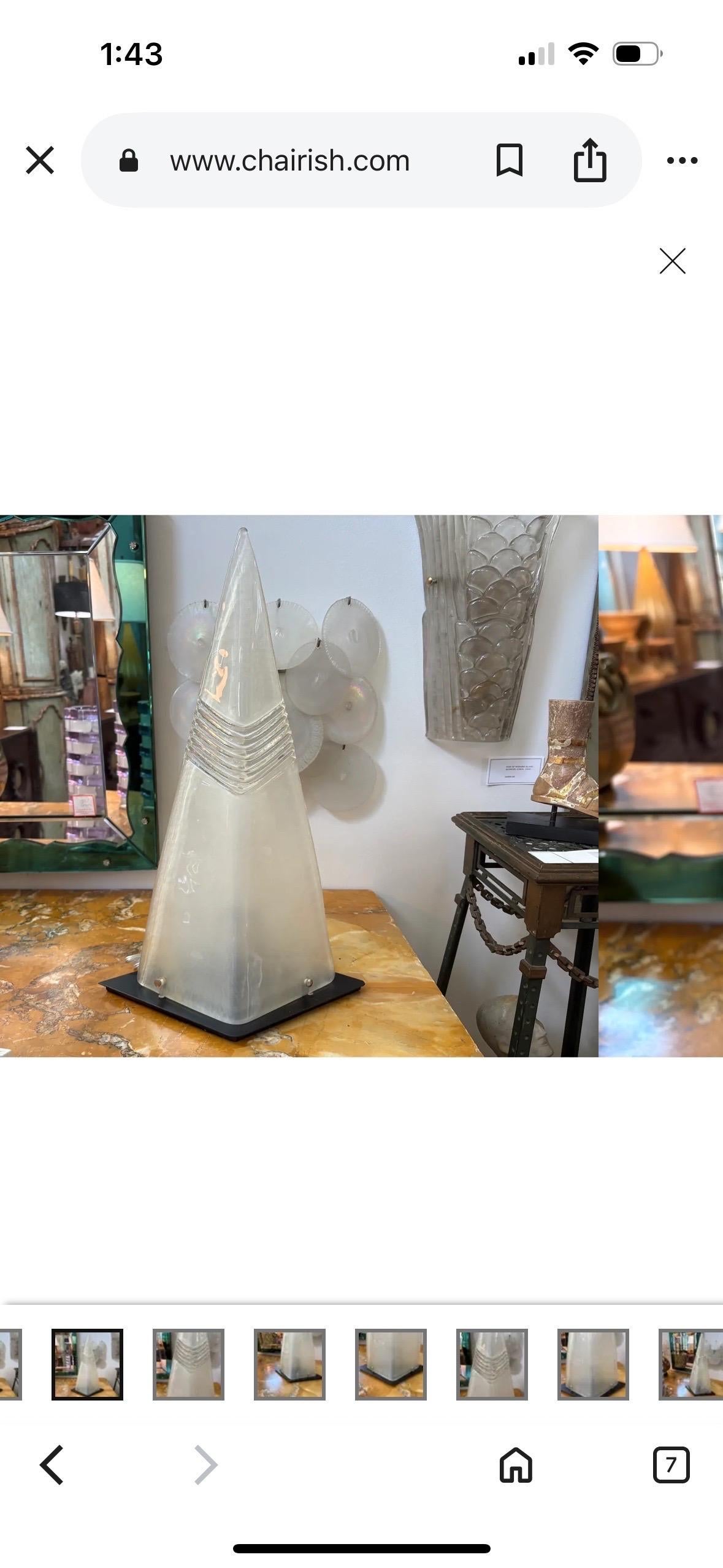 Italian Modern Murano Glass Table Lamp .
Offered is a striking Post-Modern Murano glass lamb by Vetro Eseguito Da Maestri.
This most unusual sculptural Murano lamp is comprised of two hand blown Murano glass modified triangular panels on a steel