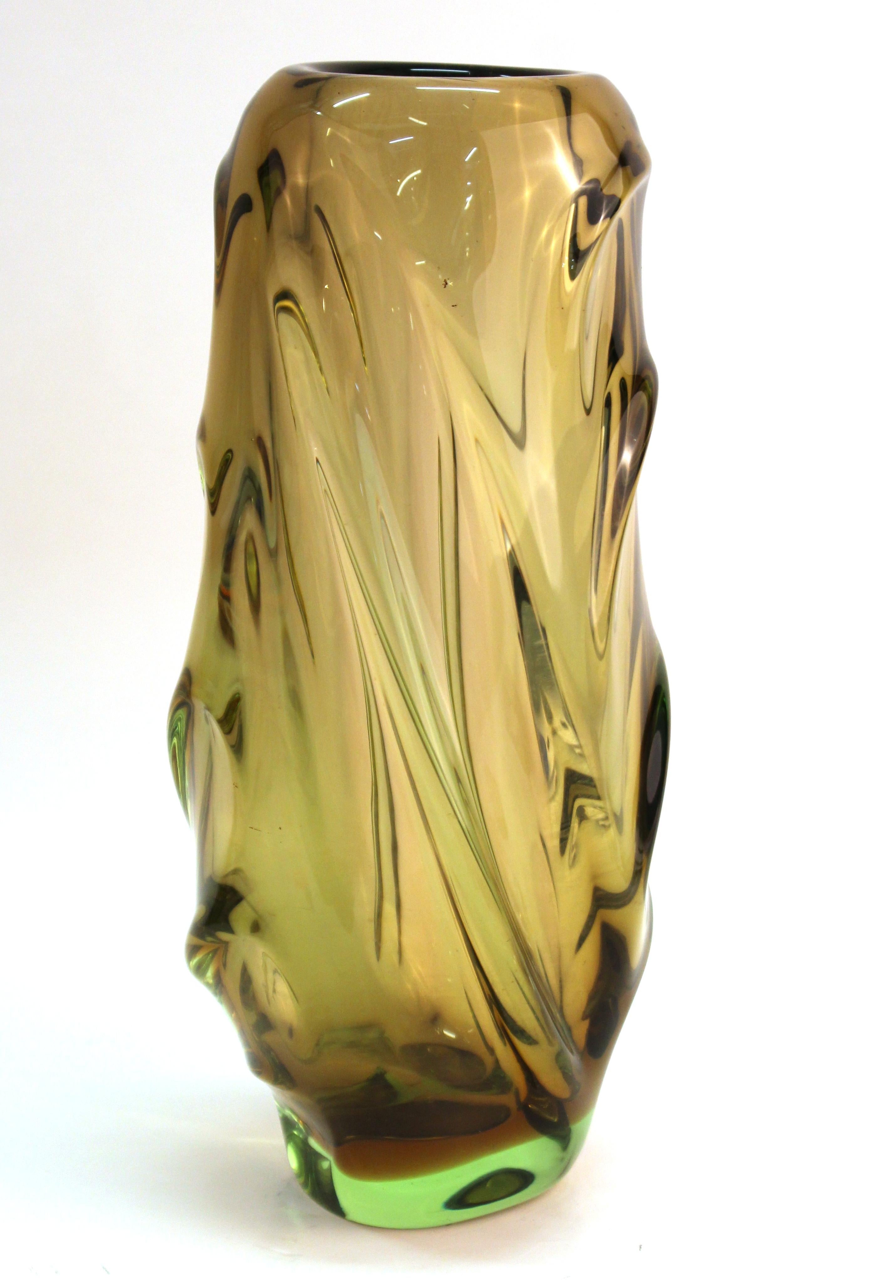 Italian modern Murano art glass vase in smokey green. The piece has sinuous swags and is unmarked. In great vintage condition with age-appropriate wear and use.