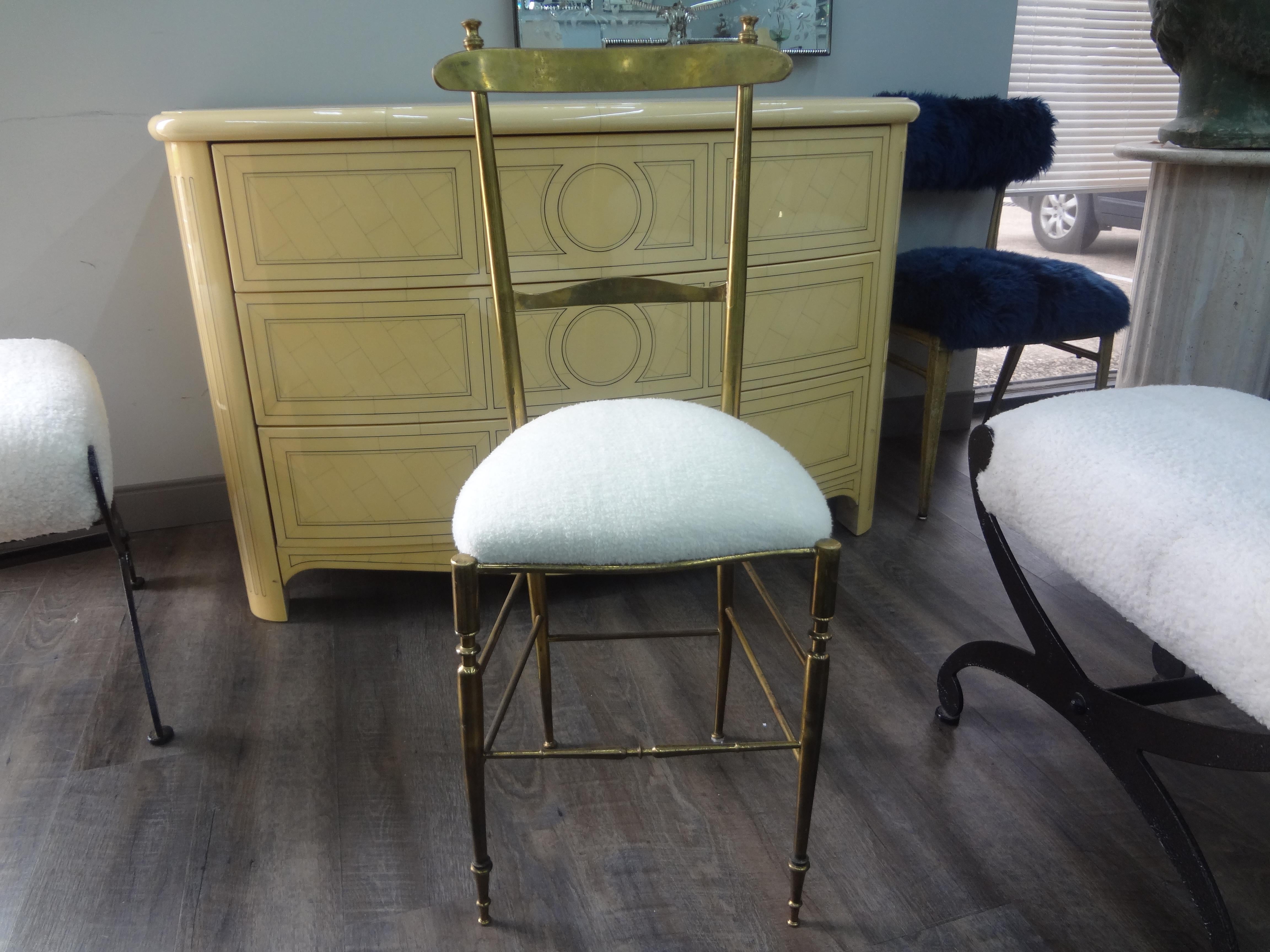 Vintage Italian Modern Neoclassical style brass Chiavari chair. This stunning Italian Chiavari chair is newly upholstered in a lovely white mohair fabric. Our Italian brass chair is perfect flanking a console table, as a vanity chair, desk chair or