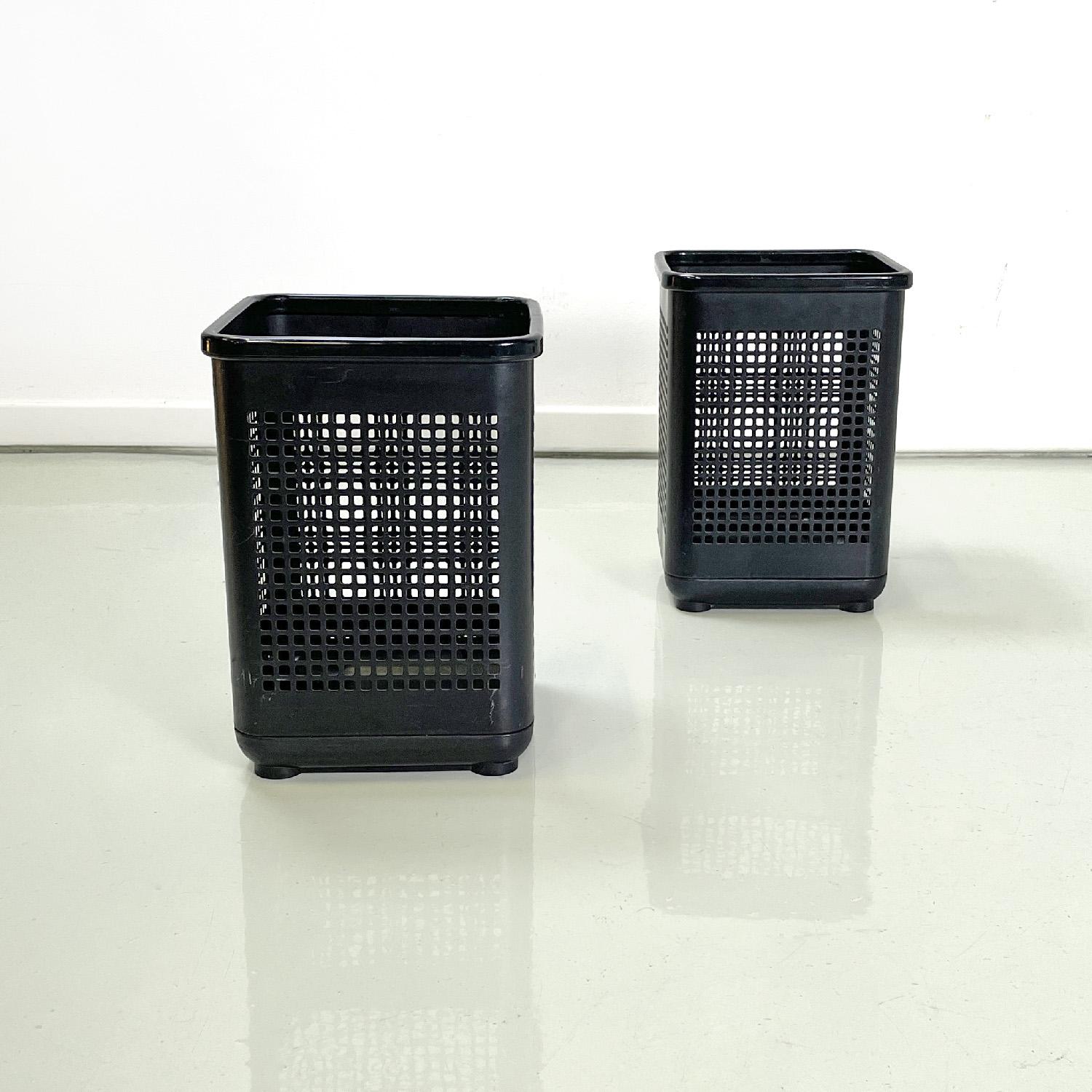 Italian modern office bins in black metal and plastic by Neolt, 1980s
Pair of square-based office bins. The main structure is made of a perforated sheet metal with square holes, and is painted black with a matte finish. The top and base with round