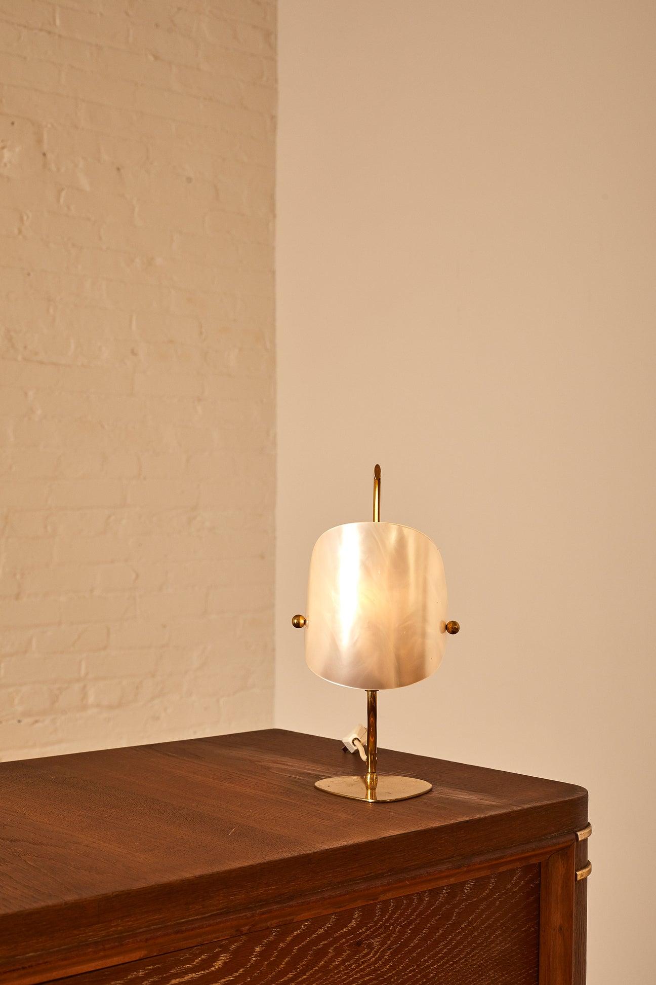 Italian modern miniature table lamp, featuring brass detailing and an opal shade.