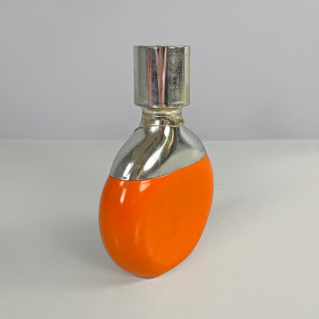 Italian modern orange and silver bottle Cremidea Amaretto by F.lli Beccaro 1970s In Fair Condition In MIlano, IT