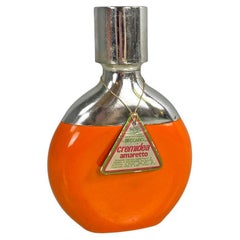 Italian modern orange and silver bottle Cremidea Amaretto by F.lli Beccaro 1970s