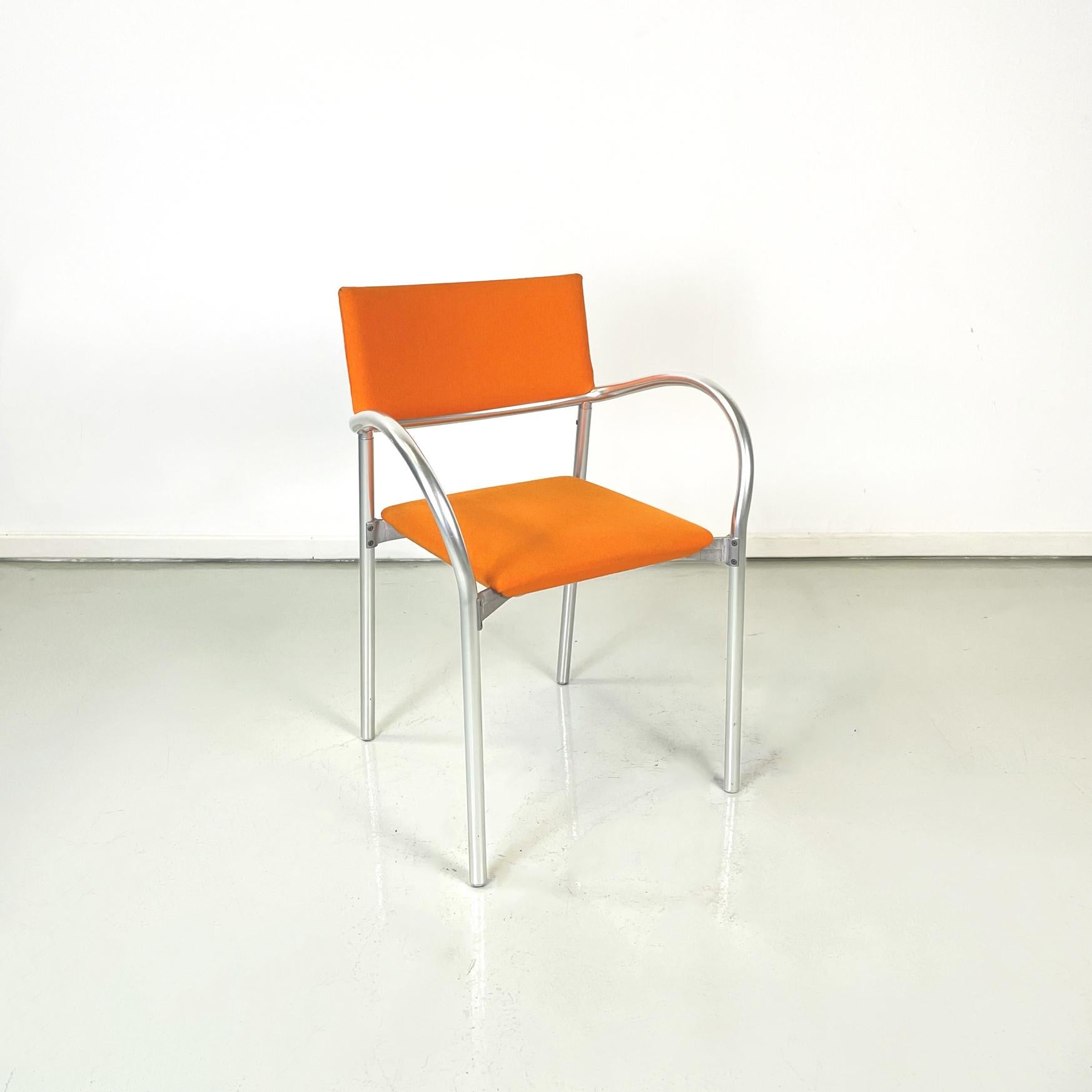 Italian modern orange fabric Chairs mod. Breeze by Carlo Bartoli for Segis, 1980s
Pair of chairs mod. Breeze with matt aluminum tubular structure. The seat and backrest are padded and covered in orange fabric. Armrests present. Chair suitable for