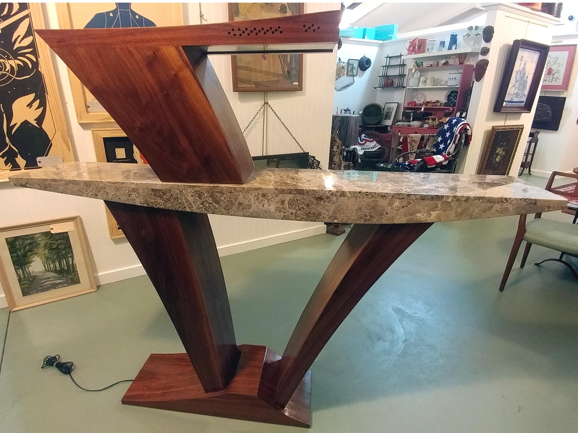 One of a kind bespoke vintage Italian dry bar cocktail table. Constructed in 2 parts, a sculpted marble top with honeycomb like 3 drawers and recessed lighting beneath contour roofing. Set on top an asymmetrical rosewood pedestal base. Unusual
