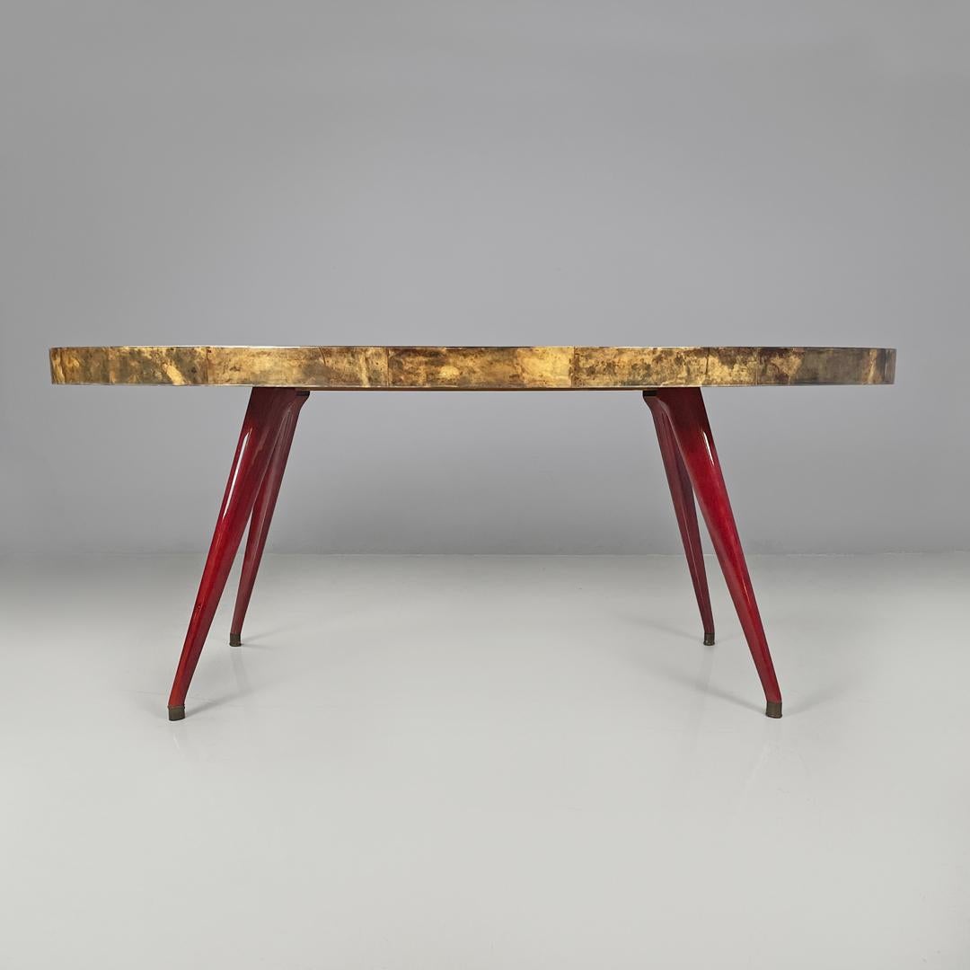 Table de salle à manger italienne moderne ovale en parchemin avec pieds en bois laqué rouge 1970 Bon état - En vente à MIlano, IT