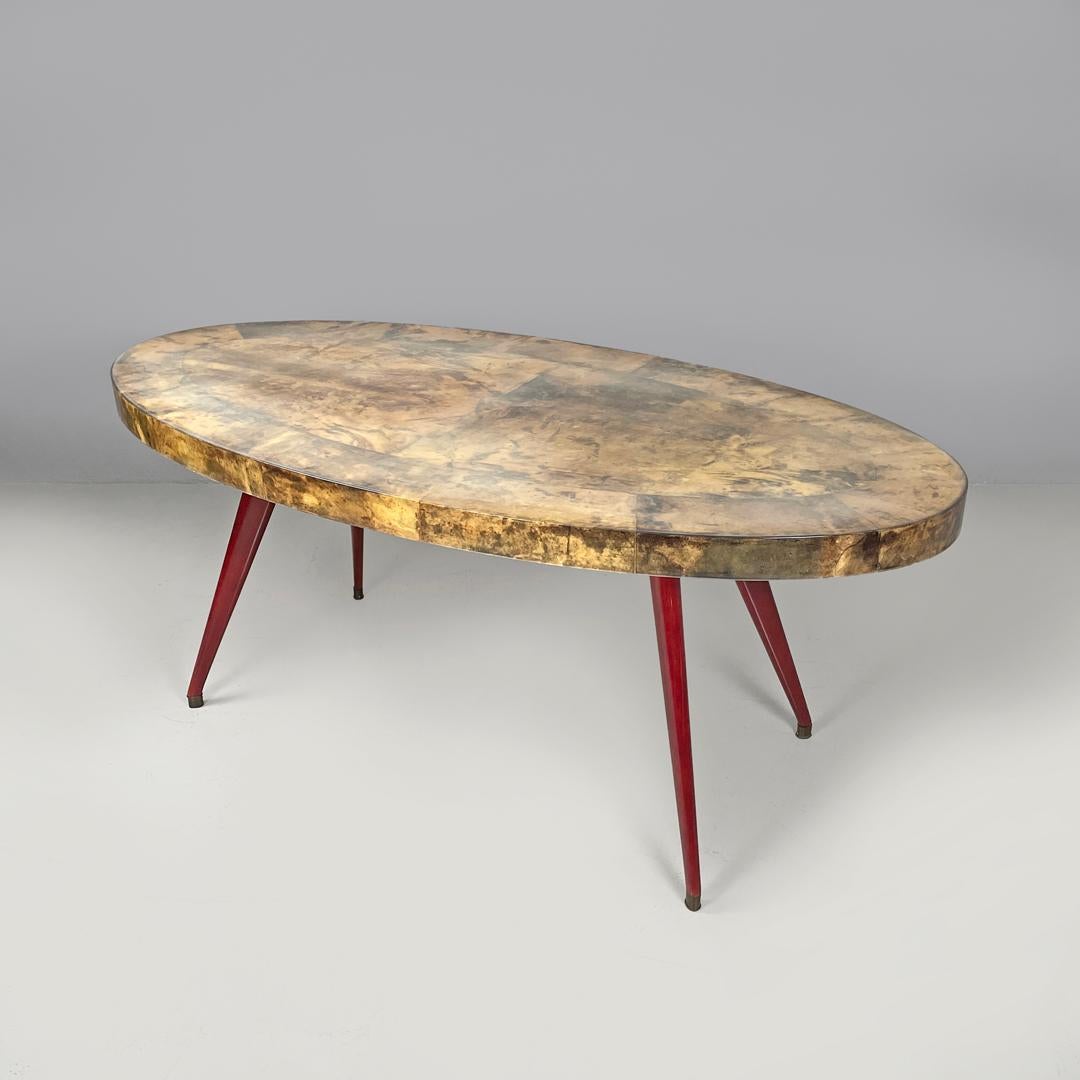 Fin du 20e siècle Table de salle à manger italienne moderne ovale en parchemin avec pieds en bois laqué rouge 1970 en vente