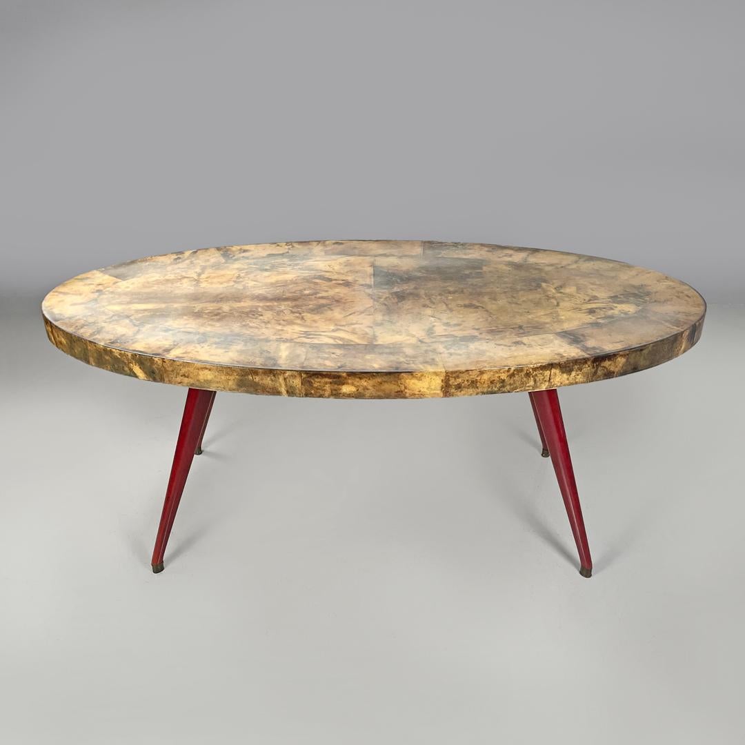 Table de salle à manger italienne moderne ovale en parchemin avec pieds en bois laqué rouge 1970 en vente 3