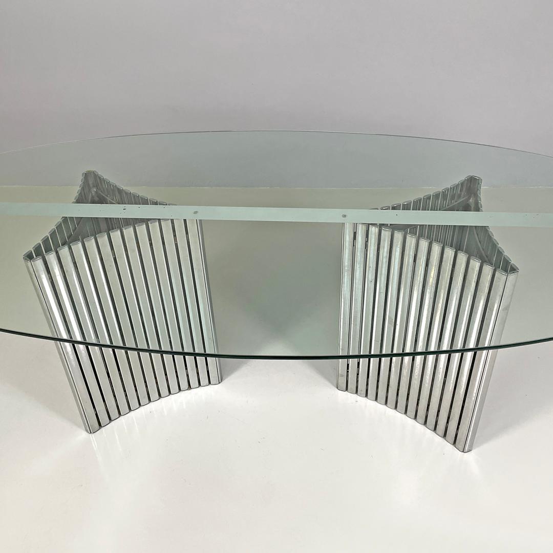 Italian modern oval glass top dining table with chromed metal columns, 1970s 3