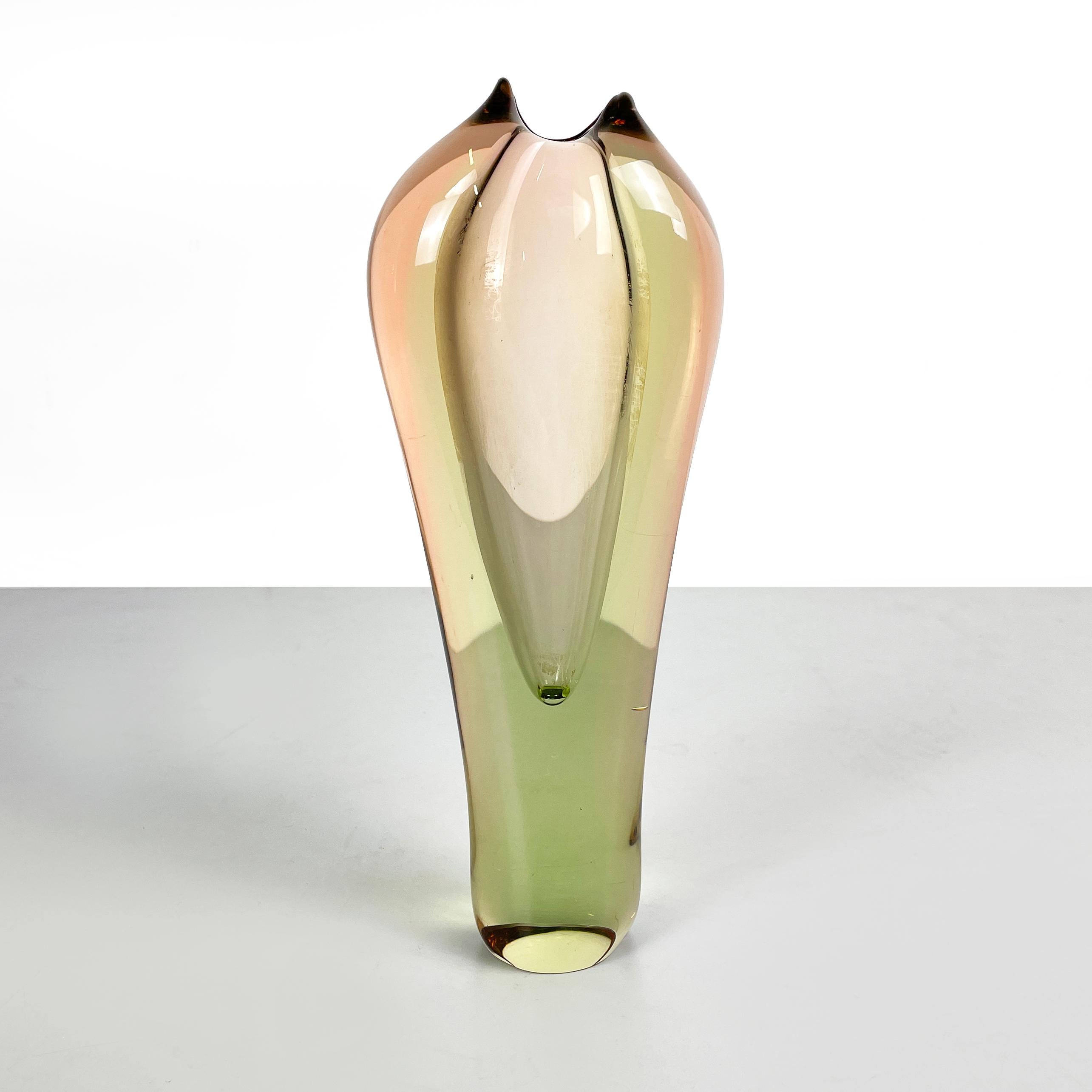 Italian modern oval pink and green Murano glass vase by i Sommersi series, 1970s
Oval-based vase entirely in thick Murano glass. The glass has different shades between pink-orange and light green tones. The shape of the vase is rounded and