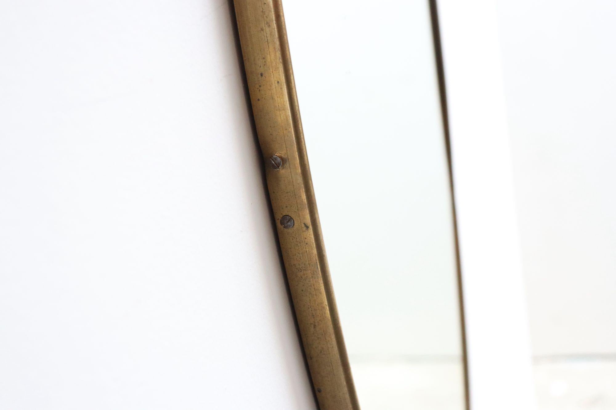 Miroir mural ovale moderne italien avec cadre en laiton d'après Gio Ponti en vente 9