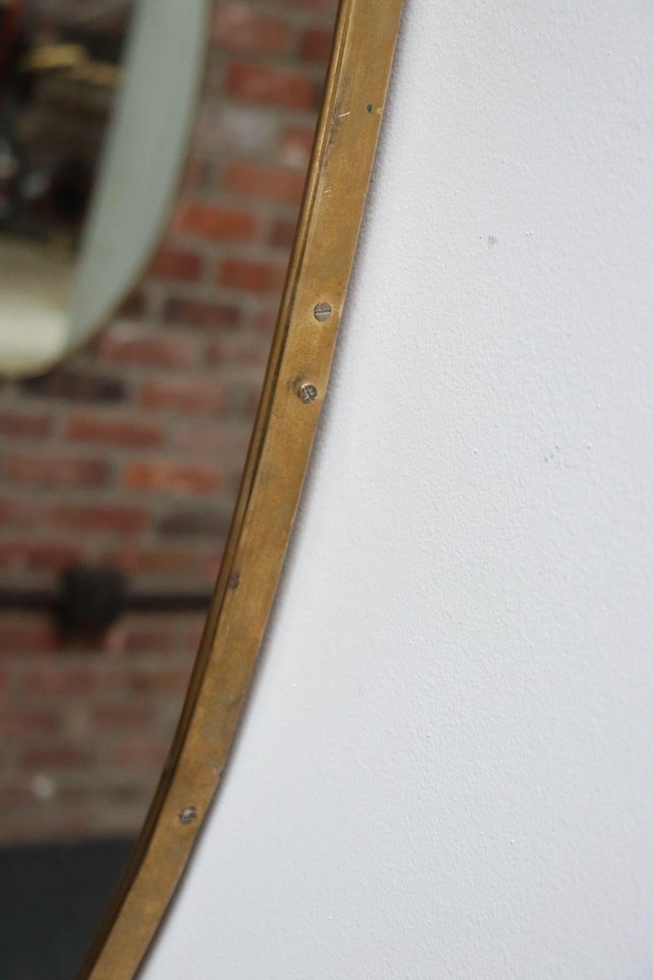 Miroir mural ovale moderne italien avec cadre en laiton d'après Gio Ponti en vente 14