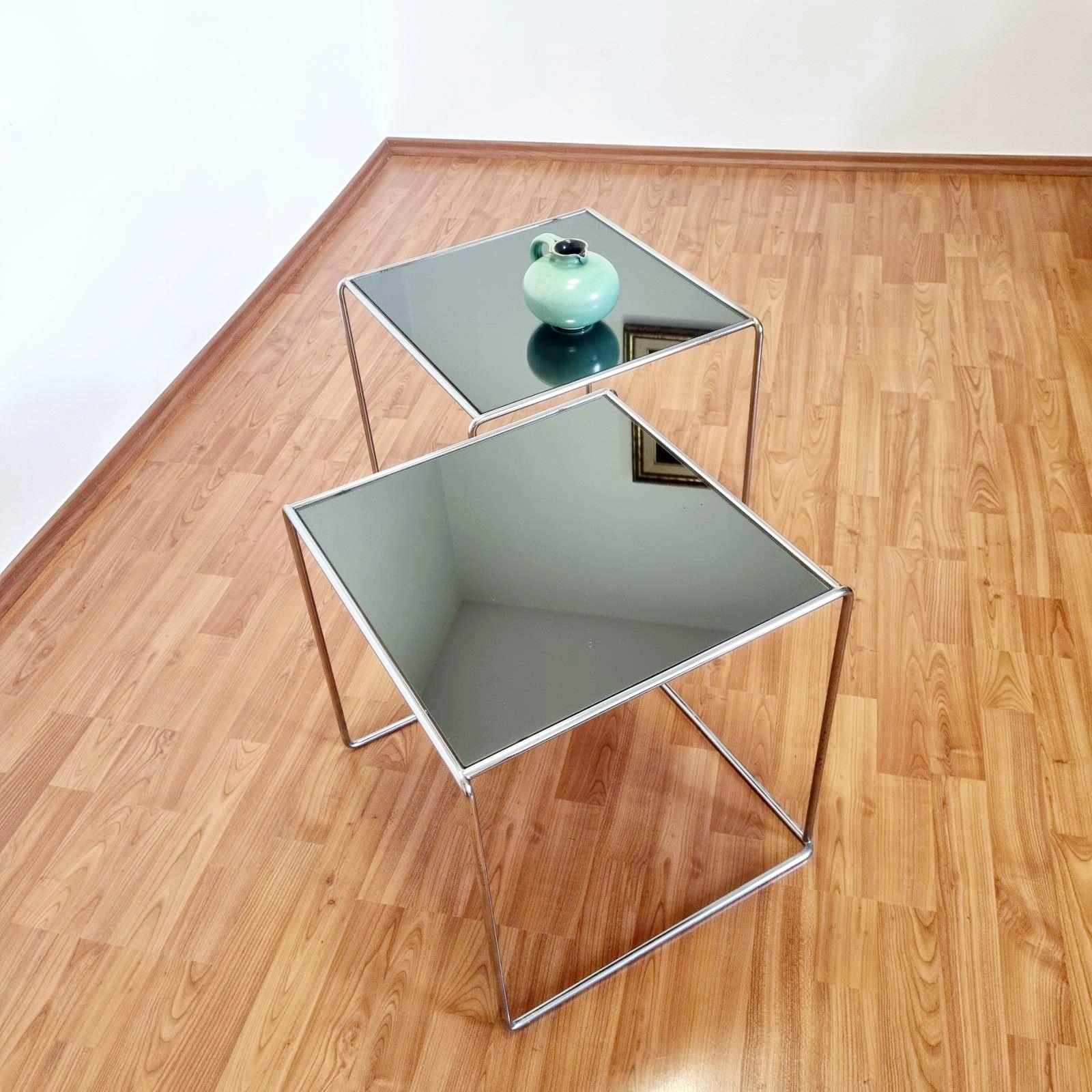 Pair of Bauhaus style side tables made in Italy in the 70s
Mirrored glass on the top
