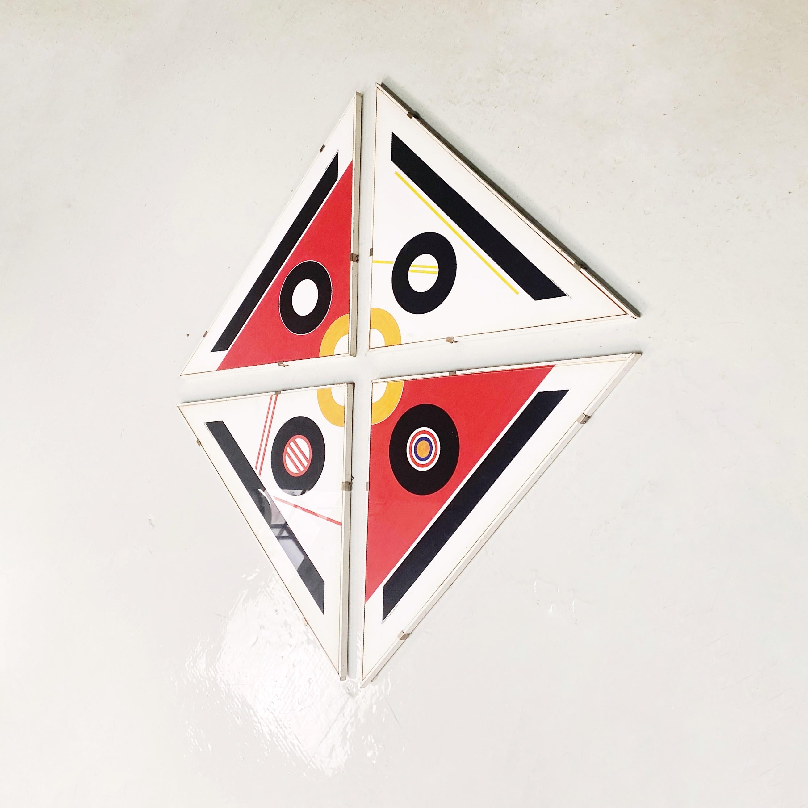 Picture with geometric decoration prints, 1980s
Set of four triangular-shaped picture with prints depicting colored circles and geometric figures. The frames are original and made to measure. It is possible to create compositions such as the