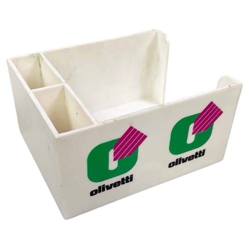 Italian modern plastic storage for Olivetti, 1970s
White plastic storage box. It has three compartments, two of equal size and one larger. The logo is printed on two sides.
It can also be used as a business card holder or pen holder.
Produced by