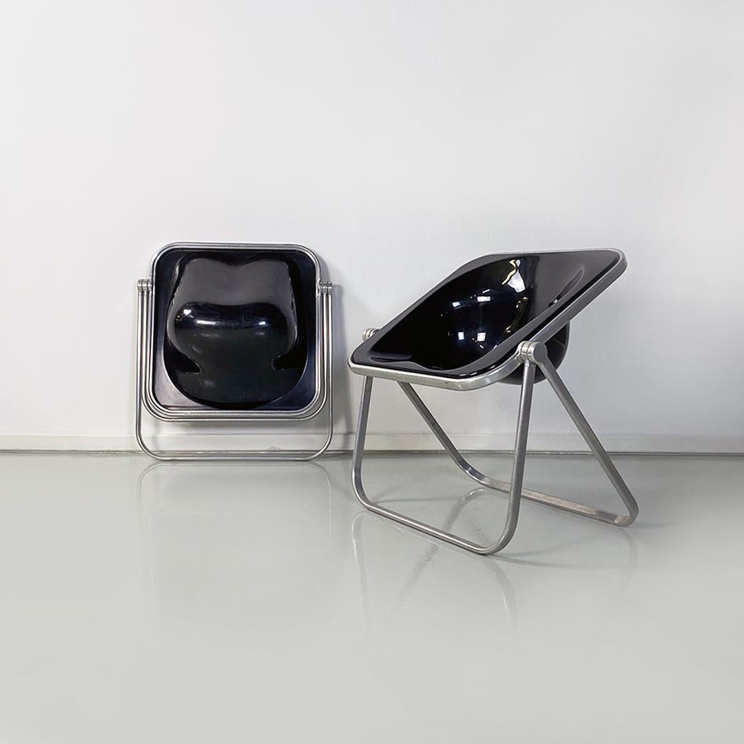 Italian modern black plastic and steel Plona armchairs by Giancarlo Piretti for Anonima Castelli, 1970s
Pair of Plona model armchairs, with aluminum structure, in the slightly smaller extent between the two existing ones. The seat consists of a