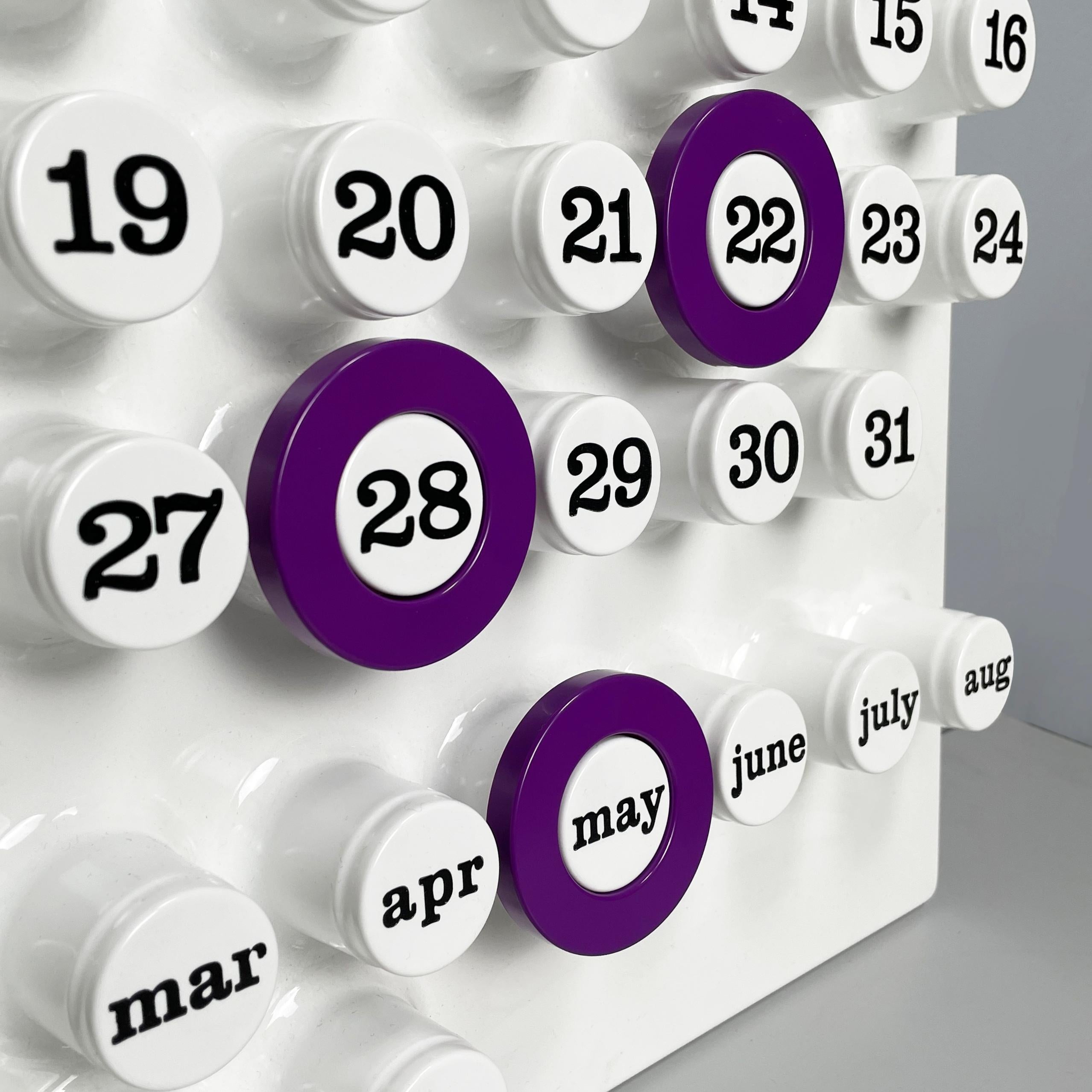 Italian modern purple rings for the perpetual wall calendar by Ring A Date, 2020s
Set of 3 round rings for the perpetual wall calendar by Ring A Date, in purple plastic. The ring has the function of marking the day, number and month on the calendar.