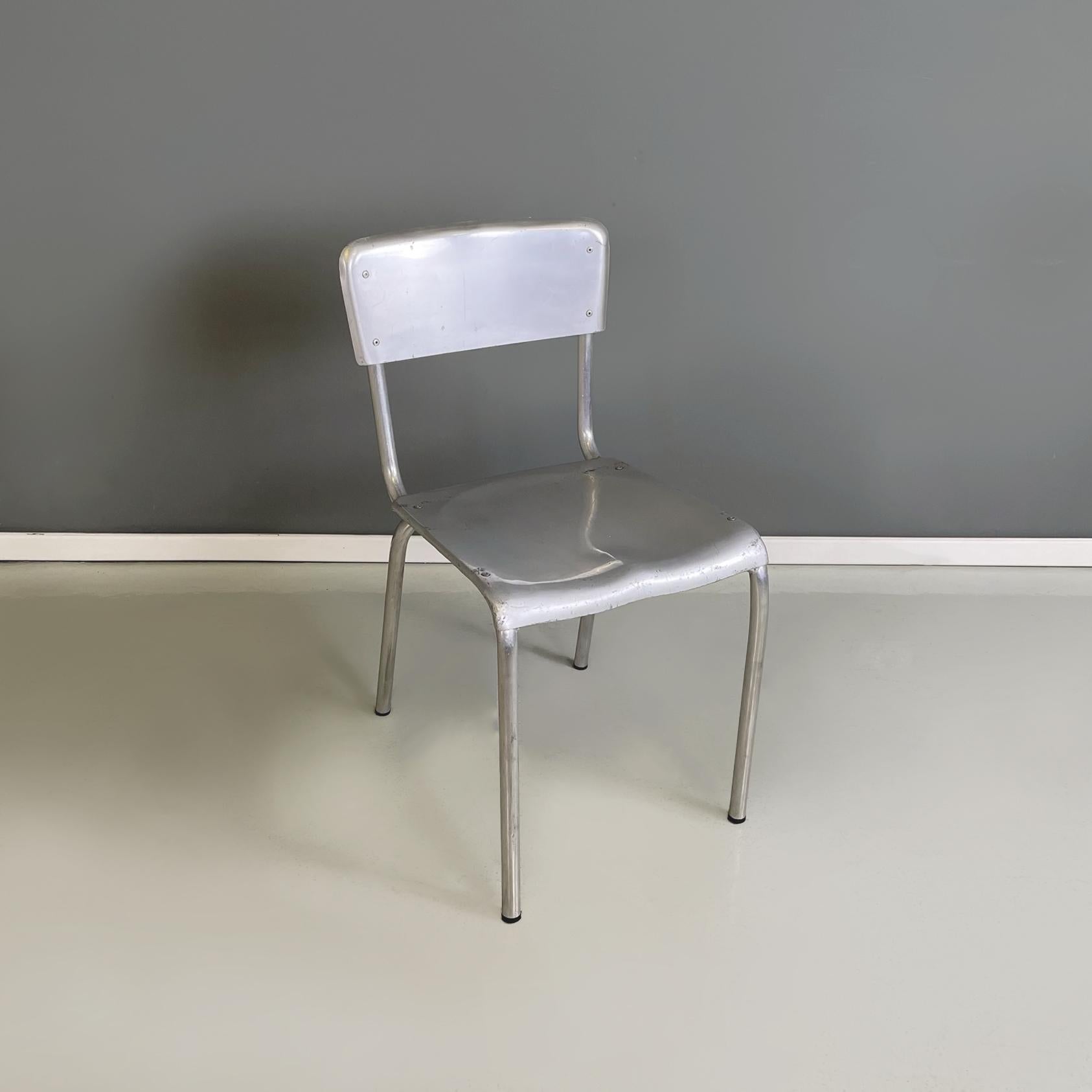 Italian modern rectangular stackable aluminium chairs, 1980s
Set of 28 stackable chairs entirely in aluminium. The chair has a rectangular seat, shaped with a slight recess. The backrest is also rectangular. The legs, also in aluminium, have a round
