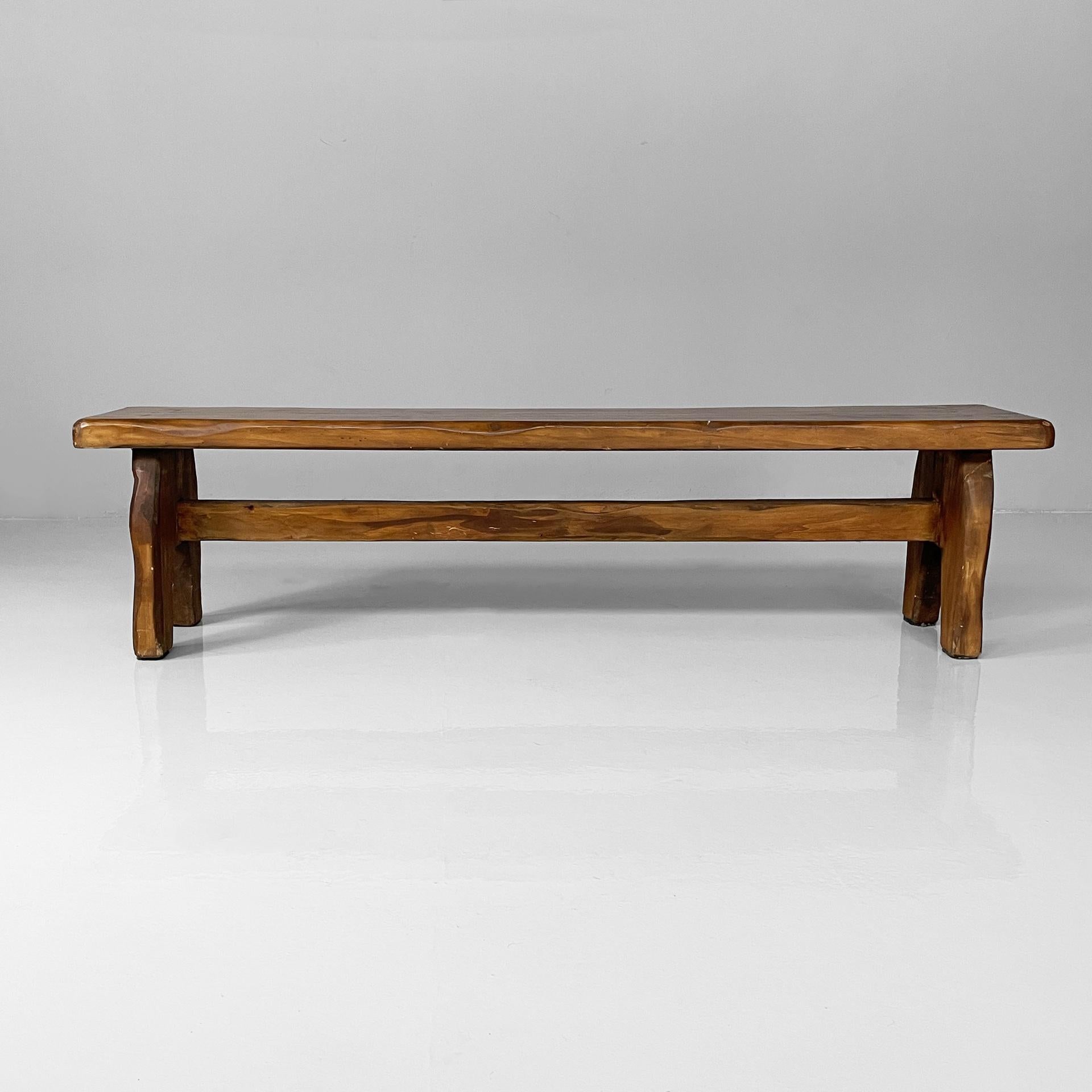Italian modern rectangular benches in wood, 1970s
Pair of benches with rectangular shaped seat and rounded corners, entirely made of wood. The legs are joined by a central crosspiece. 
1970s.
Good condition. They show signs of age and use. One bench