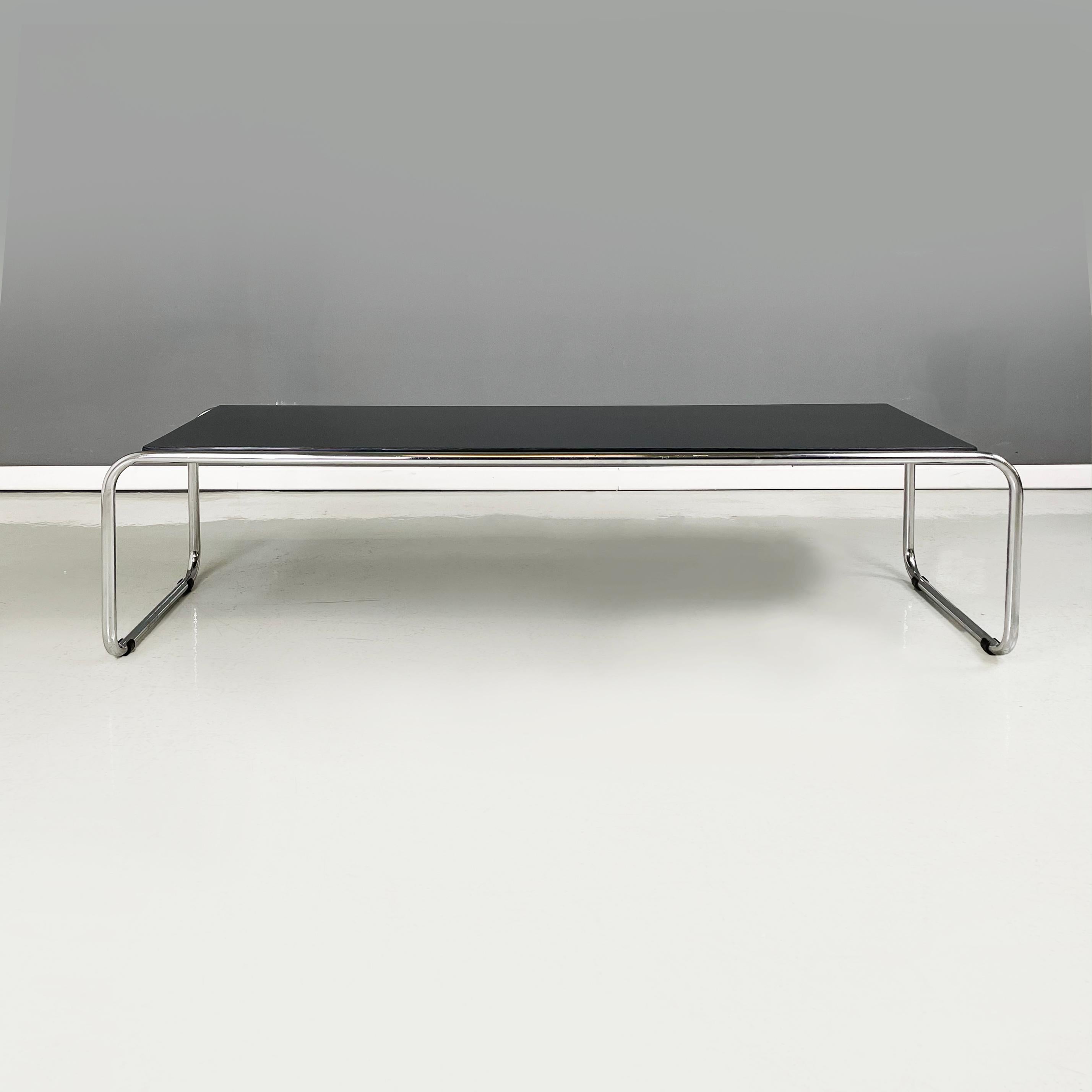 Italian modern Rectangular coffee table Laccio in black formica and steel, 1980s
Coffee table Laccio with rectangular top in black lacquered Formica. Chromed tubular steel structure.
1980s
Good condition, it has signs of oxidation on the top.