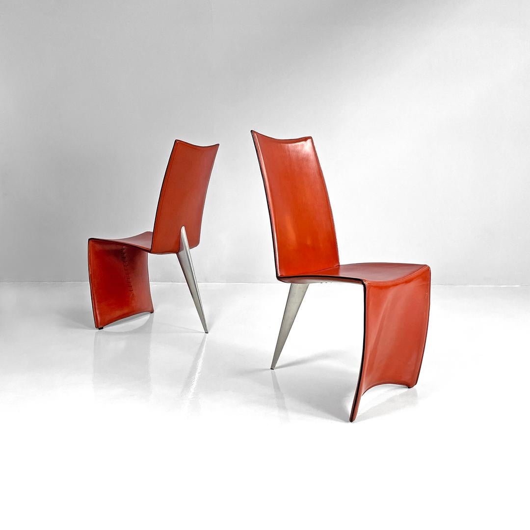 Italian modern red leather chairs Ed Archer by Philippe Starck for Driade, 1980s
Pair of chairs mod. Ed Archer in red leather. The main structure is shaped to form the backrest, seat and front support, drawing an essential and slightly rounded line.