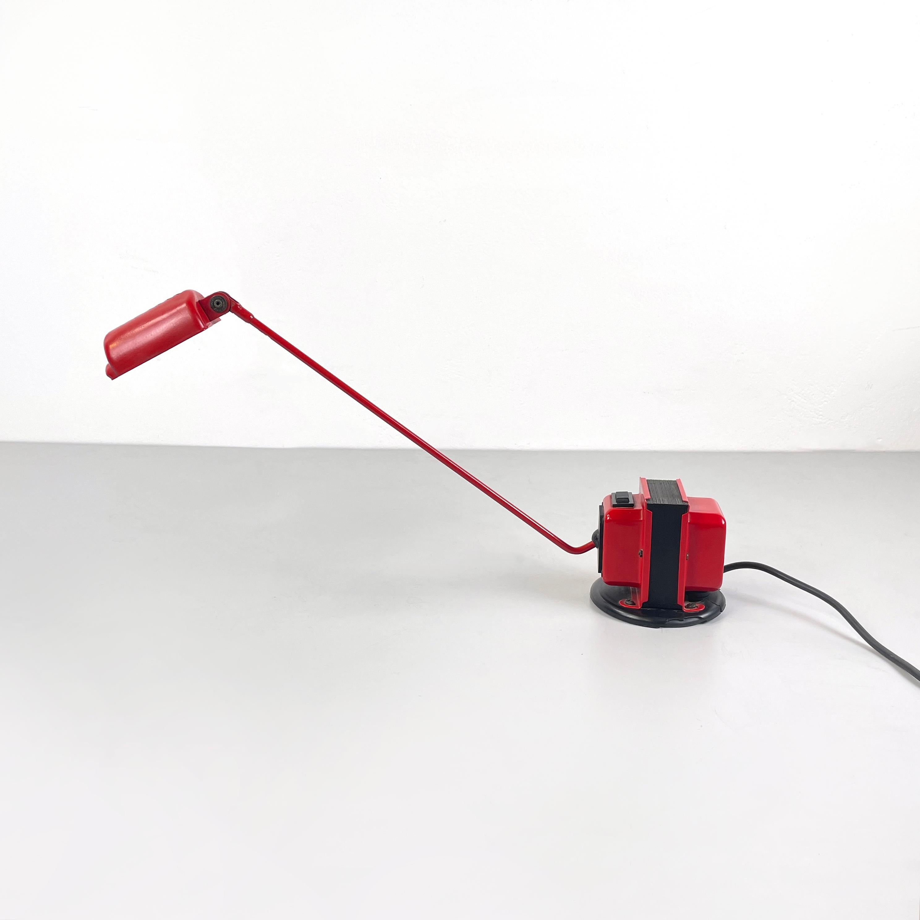 Italian modern red metal Adjustable t﻿able lamp Daphine by Tommaso Cimini for Lumina, 1980s
Adjustable t﻿able lamp mod. Daphine, in bright red painted metal. The semi-cylindrical diffuser is fully adjustable. The structure is composed of a arm with