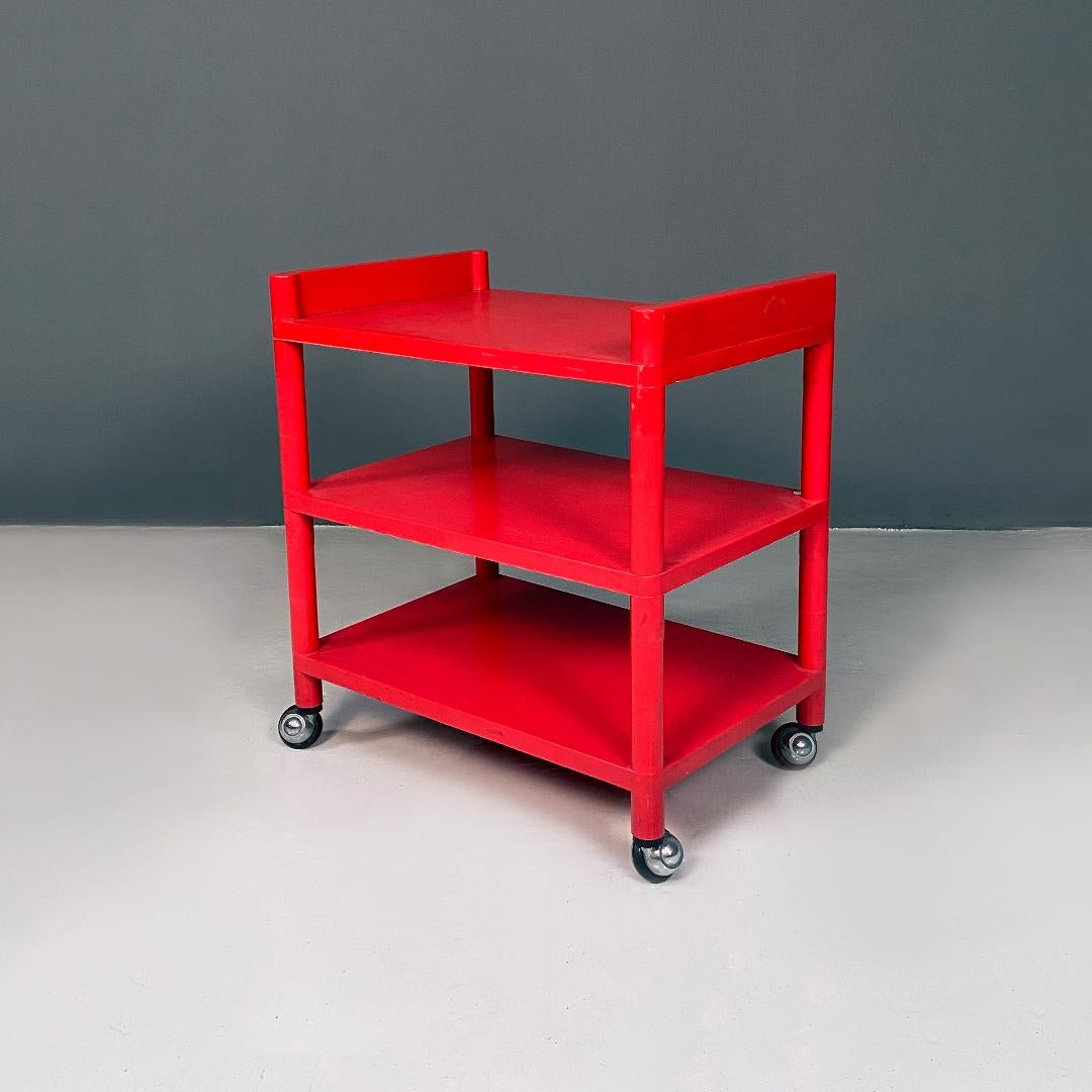 Italian modern red plastic trolley with three shelves and wheels, 1980s
Red plastic trolley, completely removable, with structure equipped with three shelves and four legs with wheels.
1980s
Very good condition
Measurements in cm 60x40x70h
