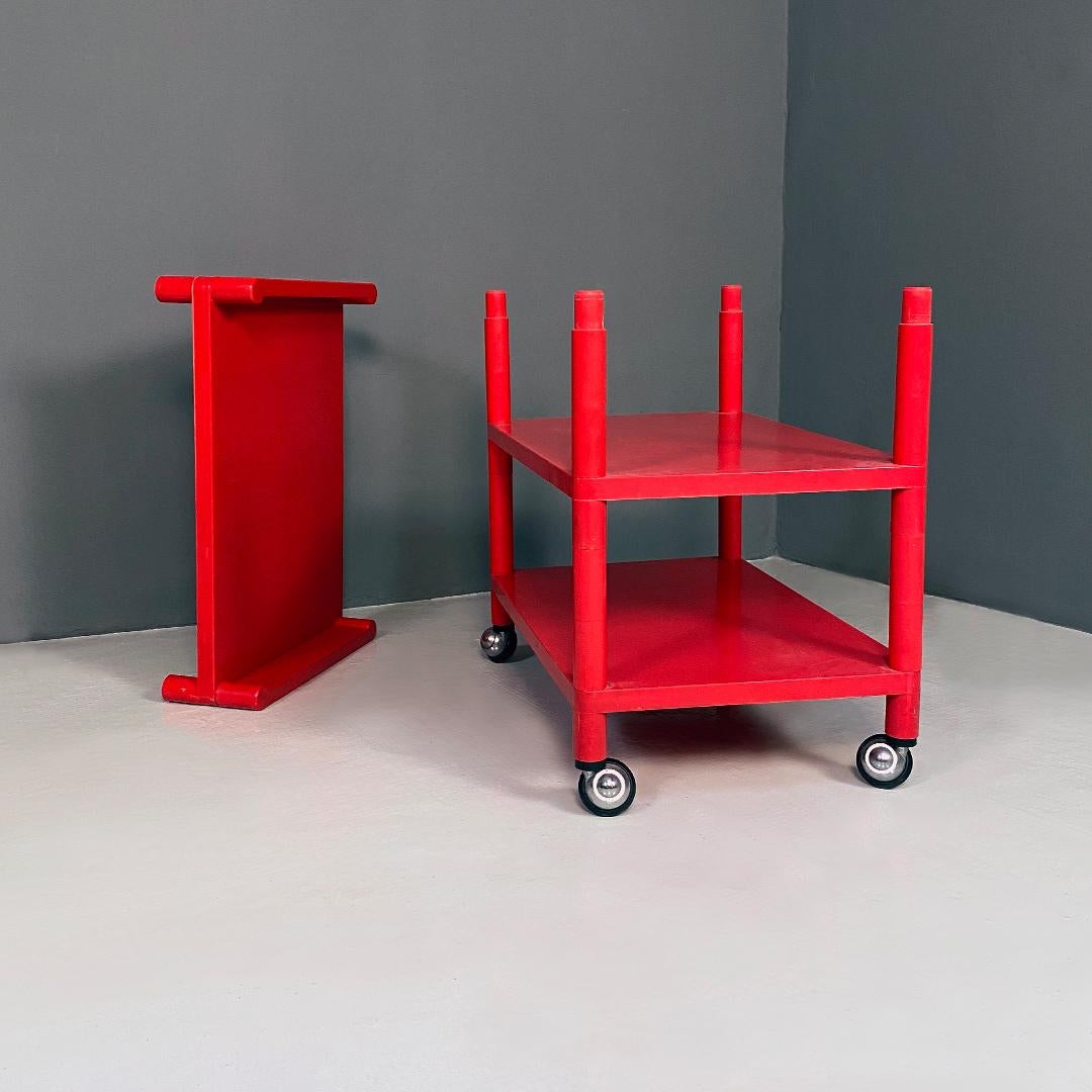 Late 20th Century Italian modern red plastic trolley with three shelves and wheels, 1980s