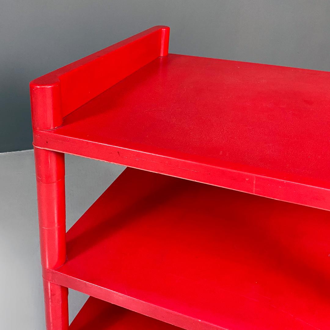 Plastic Italian modern red plastic trolley with three shelves and wheels, 1980s