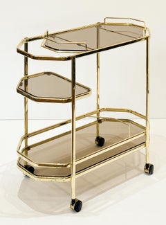 Italian Modern Rolling Drinks Cart or Console Trolley of Brass and Smoked Glass