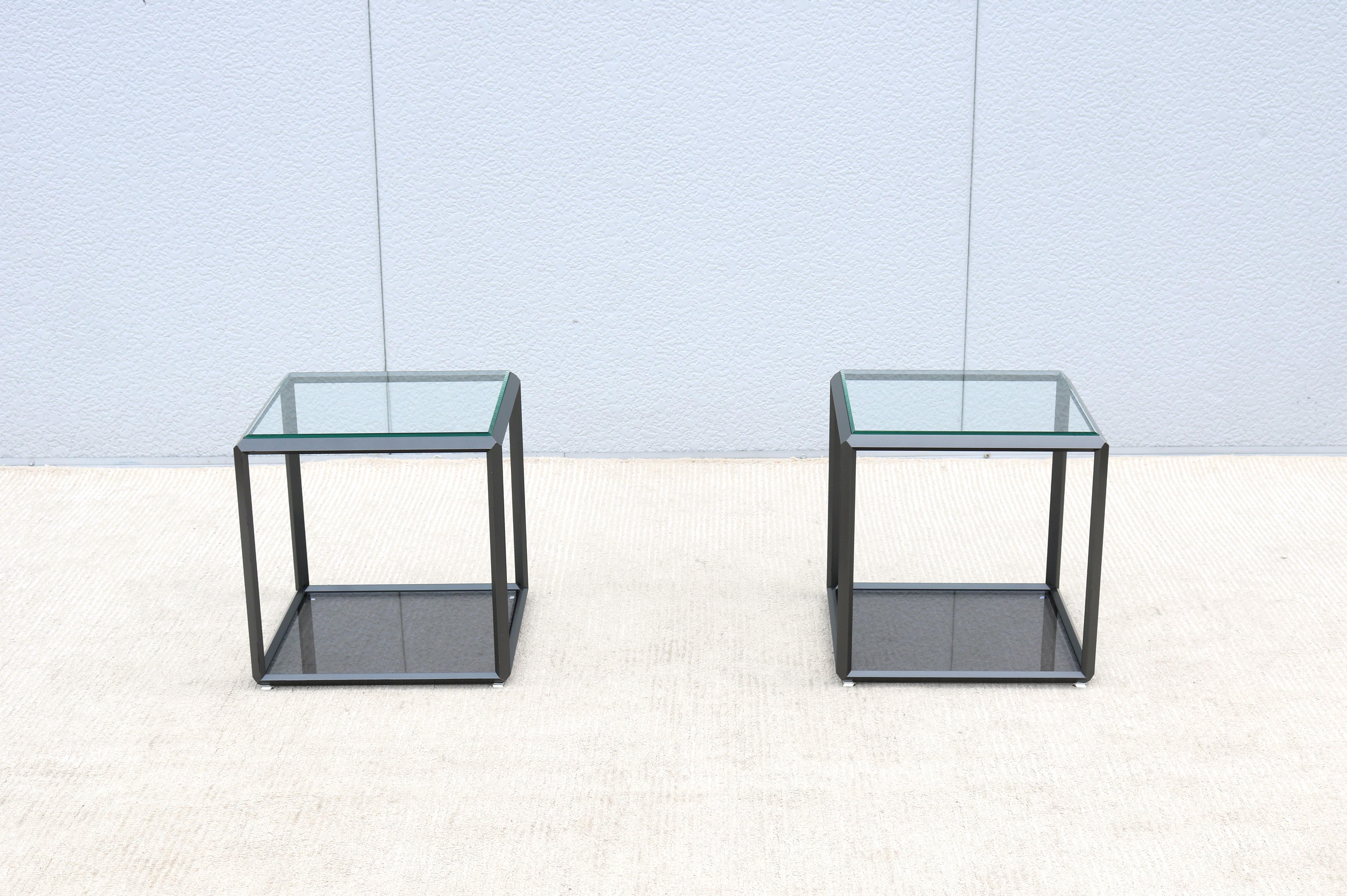 Fabulous pair of 45/Tavolino square side tables created by talented designer Ron Gilad and expert-crafted in Italy exclusively by Molteni&C.
Features a creative genius, quality materials and geometric 