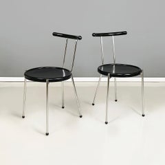 Italian modern round Chairs in black wood and metal rod, 1980s