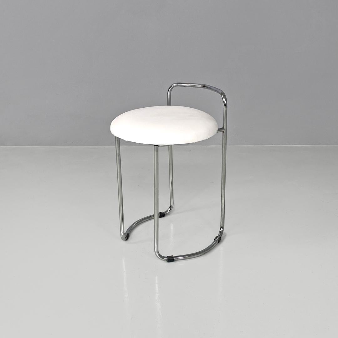 Italian modern round chromed metal stool and white faux leather, 1980s
Stool with round base, with padded seat covered in white faux leather. The main structure is in chromed metal rod, and makes up the low backrest and the two legs which, when
