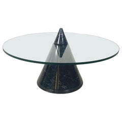 Italian modern round coffe table in glass with black marble conical base, 1980s
