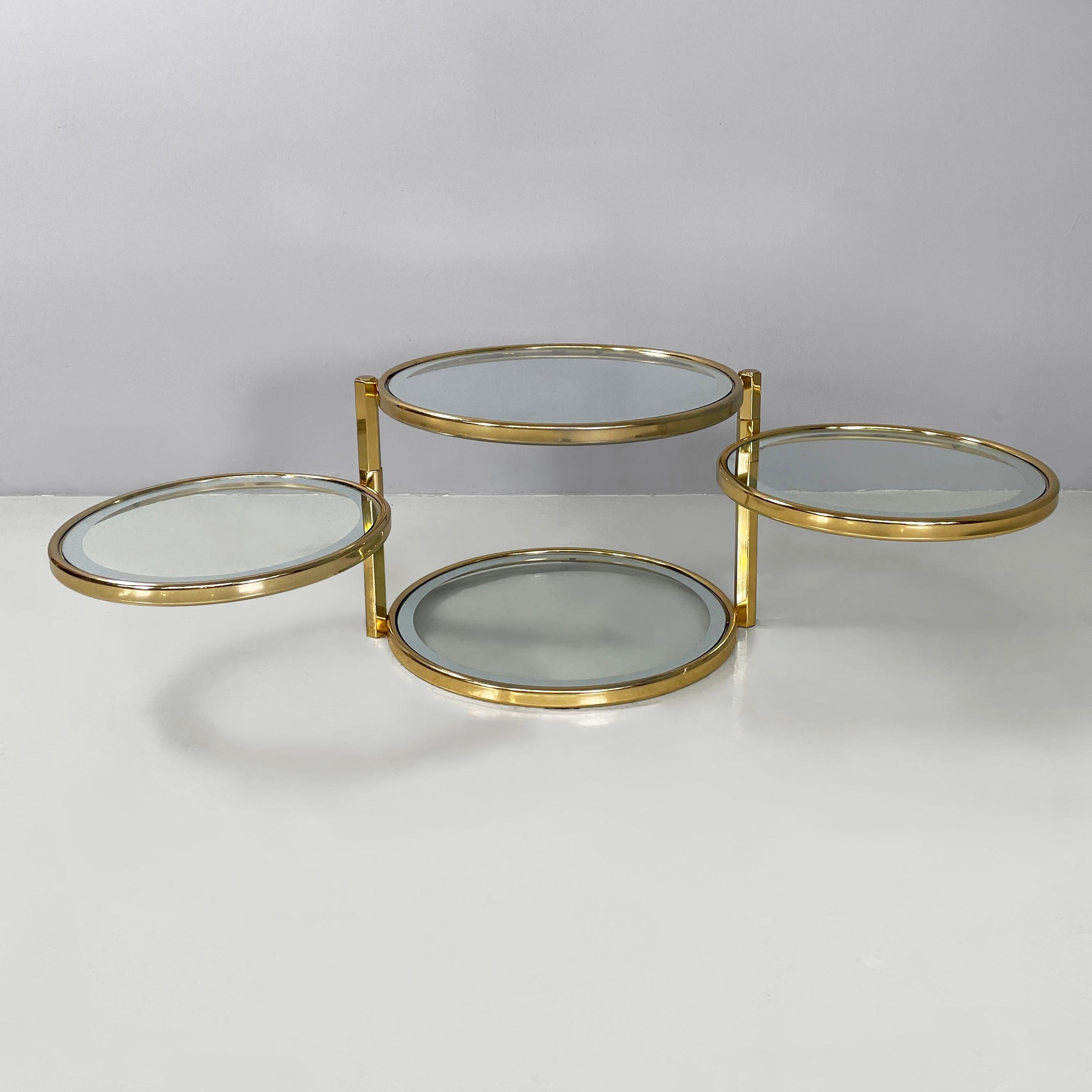 Moderno Italian modern round coffee table in brass with 4 adjustable glass tops, 1970s in vendita