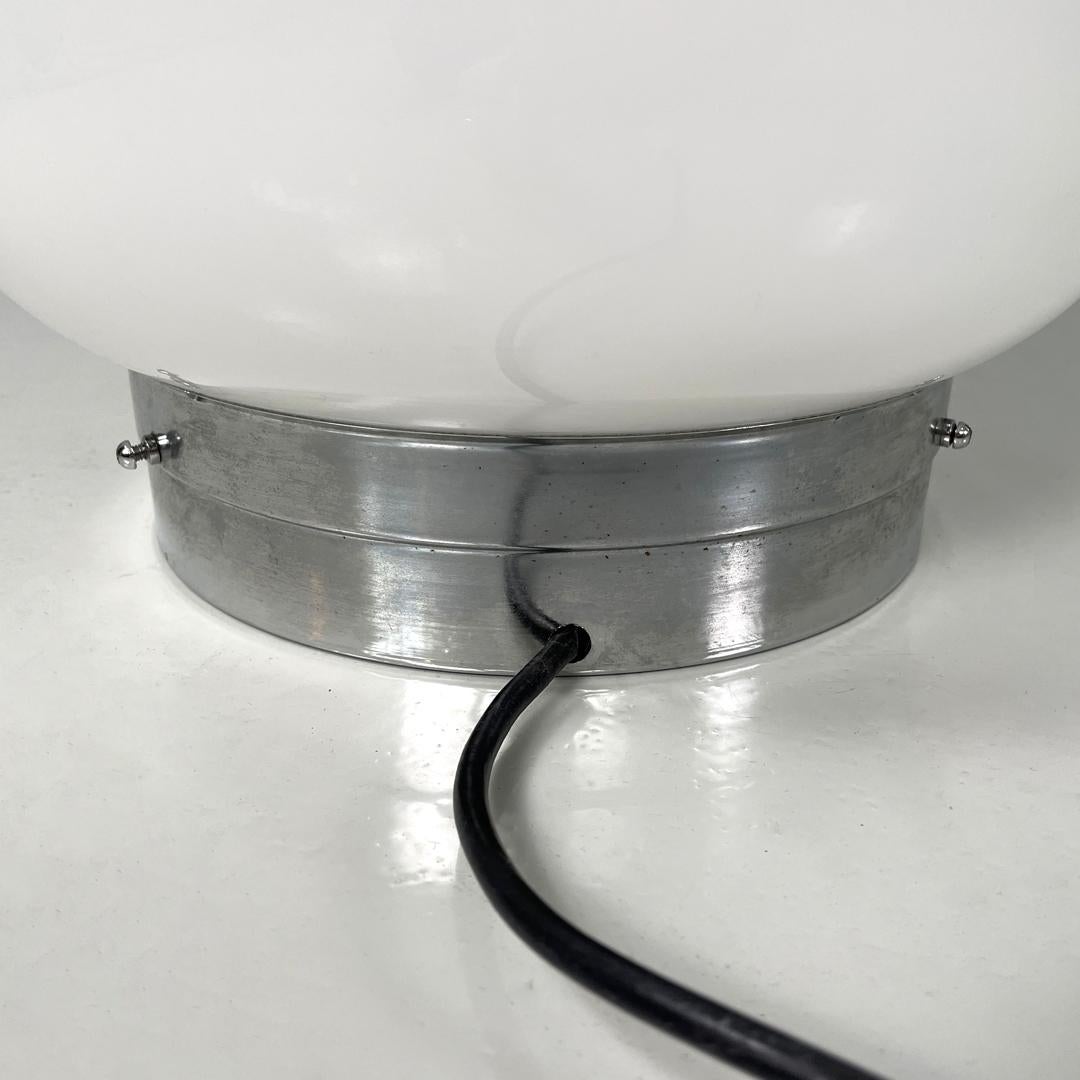 Italian modern round table lamp with curved profiles metal and white glass 1970s For Sale 10