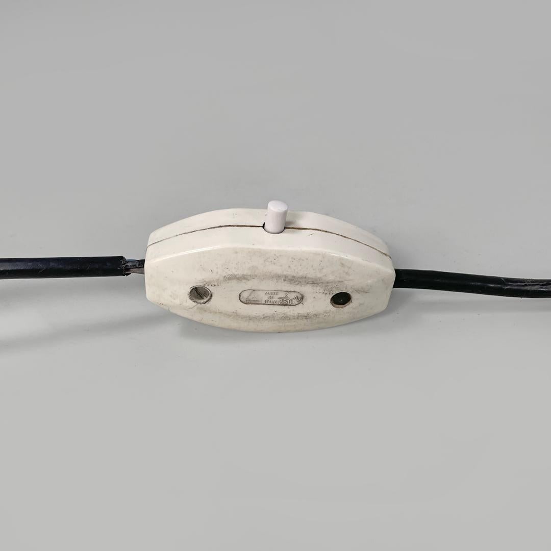 Italian modern round table lamp with curved profiles metal and white glass 1970s For Sale 12