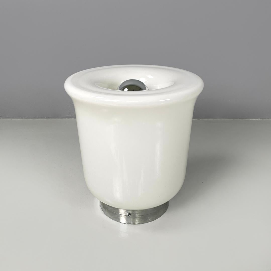 Metal Italian modern round table lamp with curved profiles metal and white glass 1970s For Sale