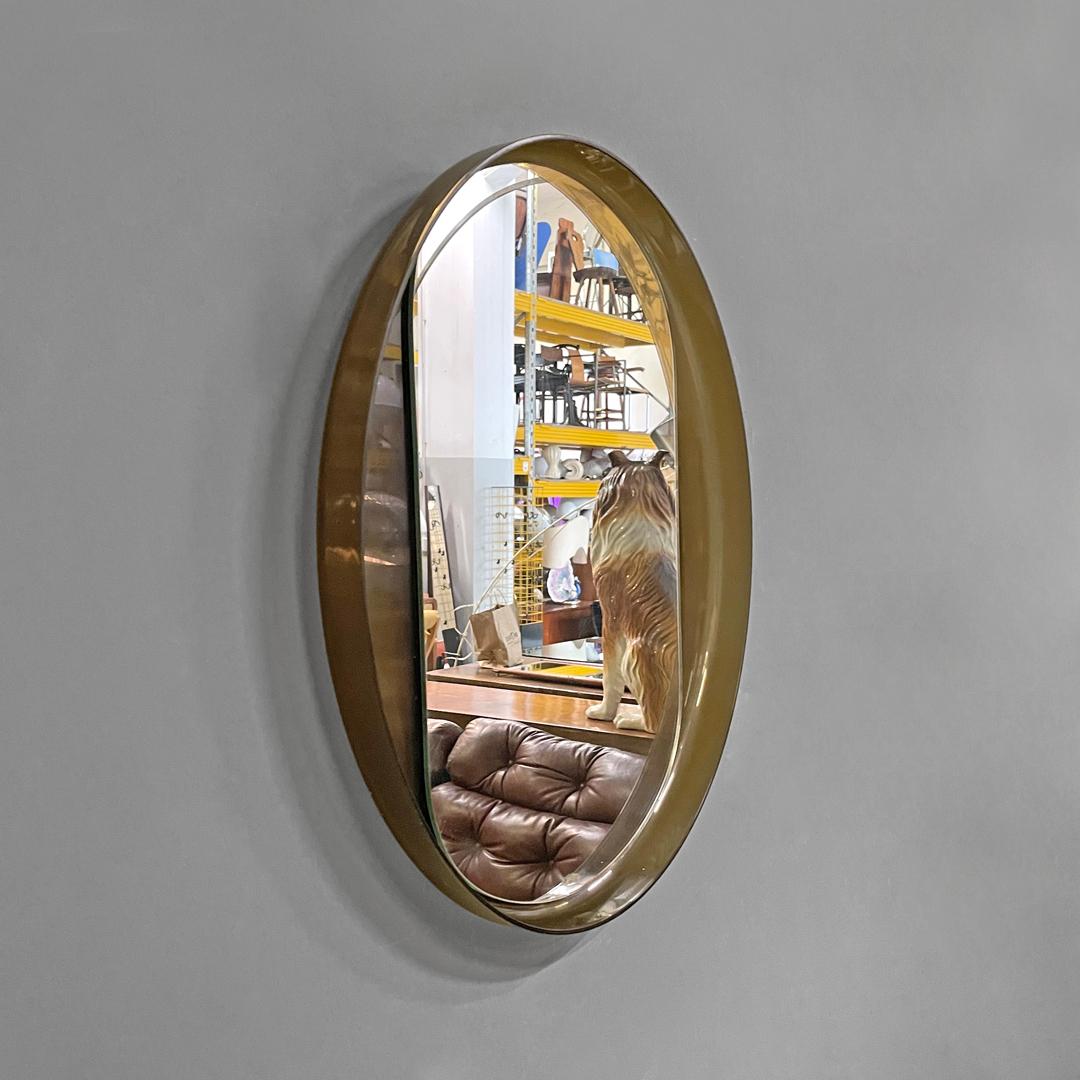 Late 20th Century Italian modern round wall mirror in semitransparent brown plastic, 1970s 